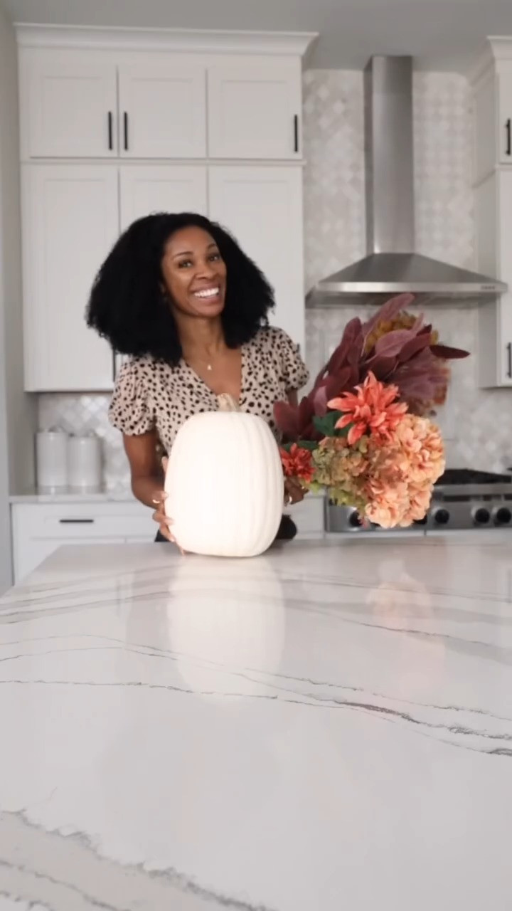 Who says pumpkins are just for carving spooky faces? Pro tip: Use a crafting pumpkin to make a chic floral vase centerpiece! Simply carve out the top, hollow it out, and pop in a glass or small jar to hold the flowers. Bonus tip: Go for seasonal blooms in warm tones to really nail that fall vibe (feel free to go faux or real flowers here). It’s a super simple, mess-free way to upgrade your table décor, and it lasts way longer than the real deal if you go faux 



#PumpkinDIY #FallFloralFun #CenterpieceGoals #CraftyAndCute #fallhomedecor #fallhomedecorideas #pumpkinvase 

 #LTKSeasonal #LTKU #LTKHome