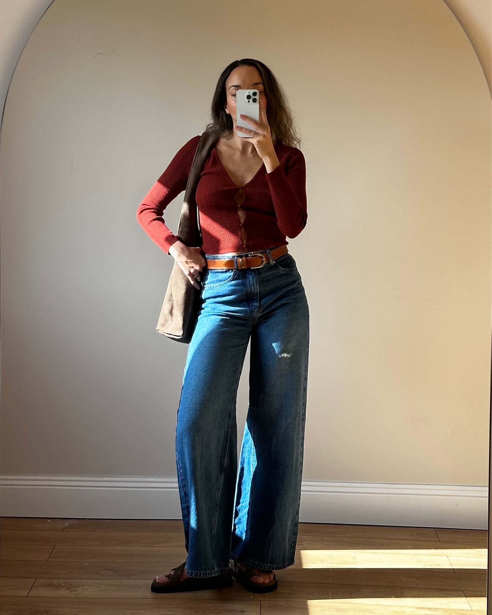 sezane top, flare jeans, spring style 
elevated basics, everyday style, spring outfit inspo, sezane knit, slouchy bag, brown tones, easy style, tonal dressing

#LTKeurope #LTKstyletip