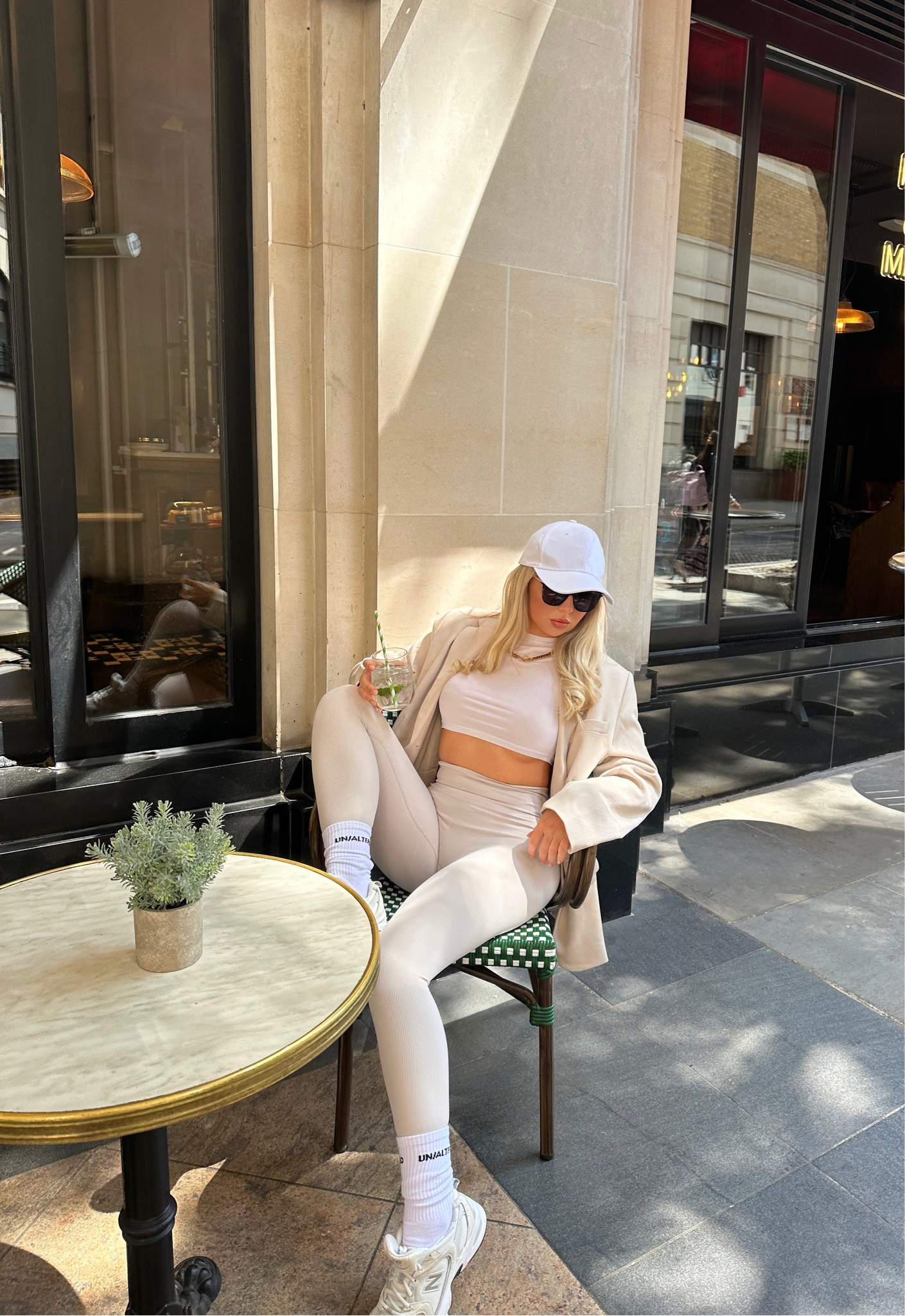 White cap, cream blazer and cream leggings look. She is wearing new balance 530s and a white crop TShirt 

#LTKSeasonal #LTKfit #LTKunder100