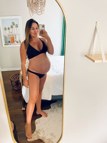 My favorite bump friendly swimsuit—& just bikini in general! I wore this through my entire pregnancy last year and plan to do the same this year— so I bought another 😜 top covers that “under boob” and bottoms are cheeky —sits perfectly low enough under belly and doesn’t show c-section scar 👌👙 wearing my usual size large top and large bottoms

The one piece isn’t maternity but works perfectly with a bump too! I did a large and it’ll be great without a bump but I also have room to grow! 🤰 ordered a large!

Bump friendly bikini, bump friendly swimsuit, black bikini, maternity swim

39 weeks pregnant here

#LTKbump #LTKswim #LTKsalealert