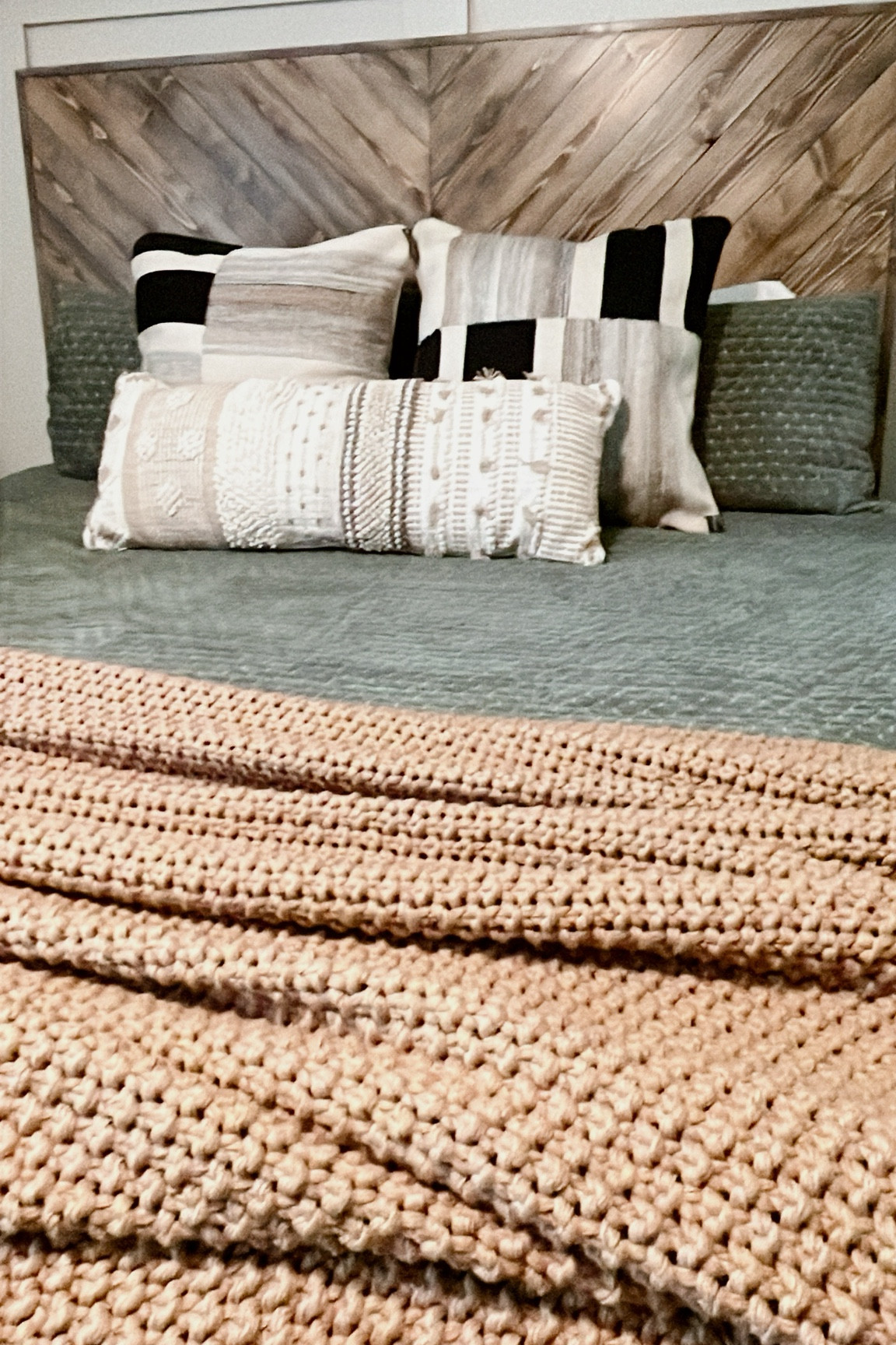 Beautiful green, ivory, black and brown bedding

#LTKHome