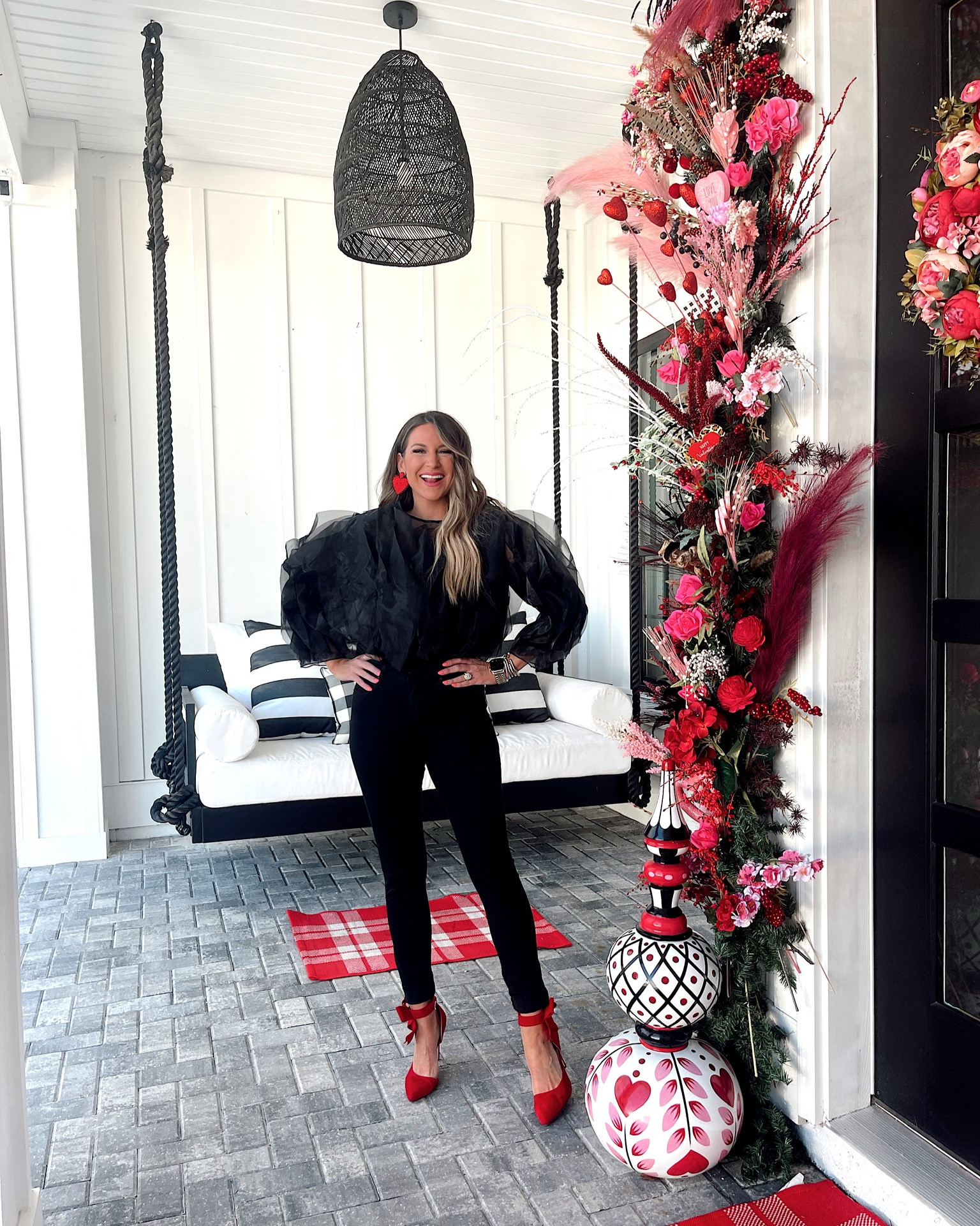 In a small puff ruffle chiffon top, size 29 jeans, red bow heels & heart earrings for Valentines Day from Amazon - all fits TTS.

#LTKSeasonal #LTKunder50 #LTKstyletip