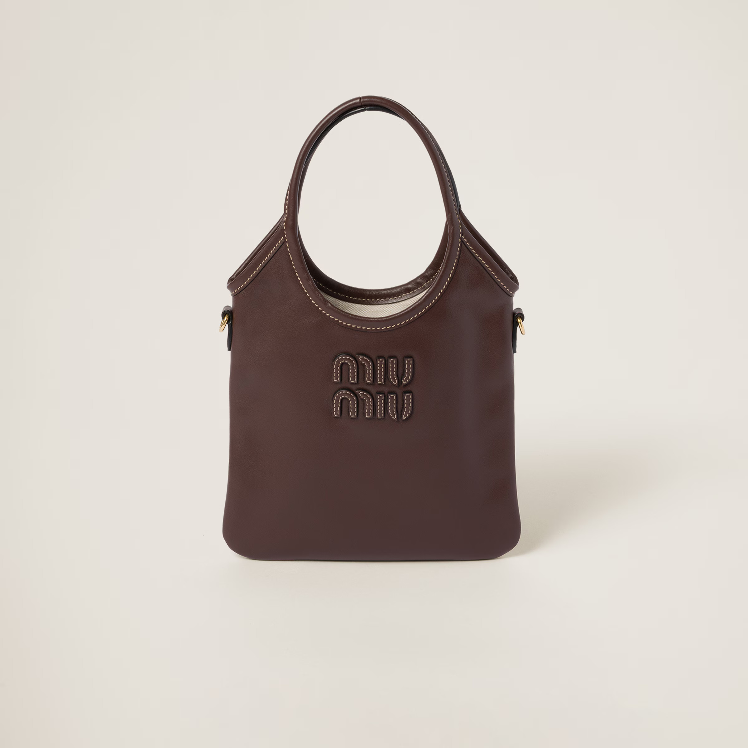 Ivy leather handbag$ 1,770miumiunux_ | Miu Miu US