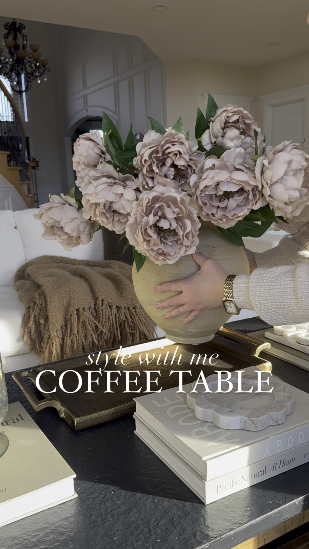 Style with me my coffee table in our Great room! So in love with this vase and florals! I always use coffee table books for styling and variety of decor pieces for visual interest.

This table was a splurge but so worth it! I am still obsessed with it. I do wish it was bigger a little (wider). 

#coffeetable #coffeetabledecor #coffeetablestyling #potterybarn #vase #florals #homedecor #moderntransitional #targetstyle #mypotterybarn #amazonhome #crateandbarrel #wayfair #wayfairfinds @wayfair @amazon @potterybarn @target 

#LTKHome #LTKSaleAlert #LTKWatchNow