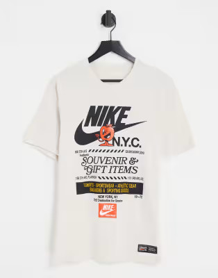 Nike NYC Souvenir graphic print T-shirt in light brown | ASOS | ASOS (Global)