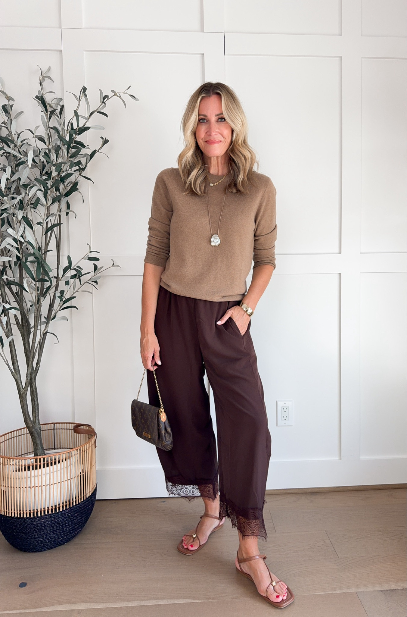 These satin pants with lace trim are such a fun way to make a casual fall outfit feel a little more special. I love the contrast of the silky fabric and feminine lace with a simple knit, tee or cardigan.

satin pants, lace trim pants, fall OOTD, casual fall outfit, wide leg pants, feminine fall style, fall outfit ideas, women’s fall fashion, transitional fall outfit, everyday fall style, statement pants, HauteandHumid

#LTKootd #LTKOver40 #LTKSeasonal