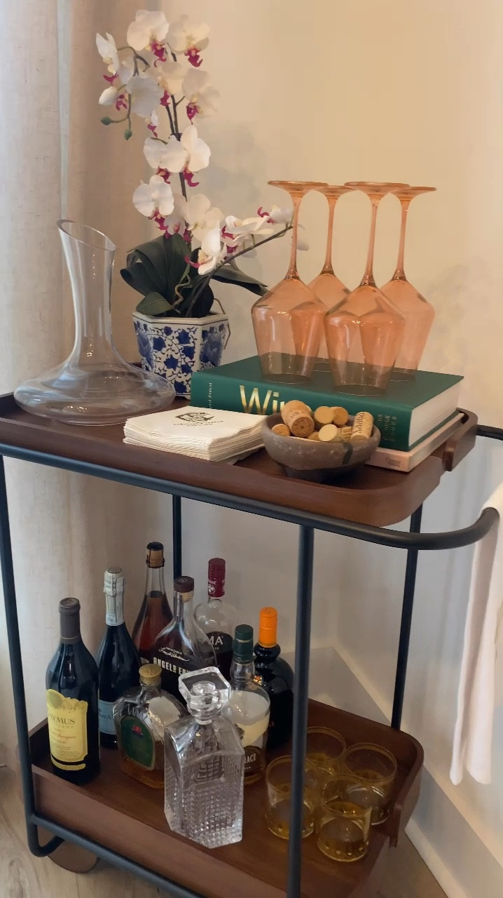 Style the Dram Bar Cart (gifted) from @burrow with me🥃 

I’m loving the modern style of this bar cart mixed with some older, vintage style pieces! What do you think? I shopped my home for everything I used to style this bar cart. It’s easy to forget all the things you already have that you could use to decorate. 🤍

#myburrow #burrowroomies #barcart #barcartstyling #barcartdecor #vintagemodernhome 

#LTKHome