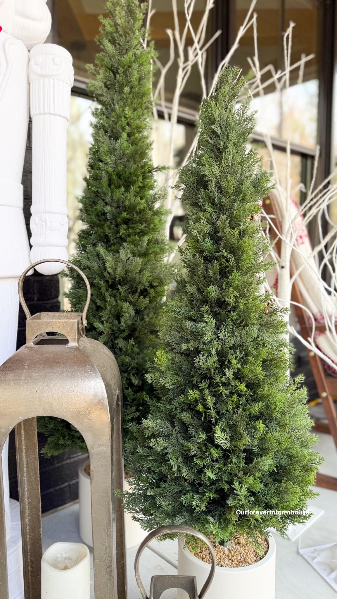 A little greenery goes a long way 🌲✨
These Nearly Natural cedar trees added the perfect classic touch to my front porch. They’re UV resistant to handle the outdoor elements and I love that they come already in the decorative white planters so there’s nothing extra to hunt down. I have the 4 foot and 5 foot here and they instantly pulled everything together.

#nearlynatural #frontporchdecor #holidayporch #christmasfrontporch #fauxtrees #porchdecorideas #porchmakeover #outdoordecor #christmasdecorideas #holidayhomedecor #porchstyling #porchgreens #uvresistantdecor #seasonaldecor #ltkhome

#LTKHoliday #LTKHome #LTKSeasonal