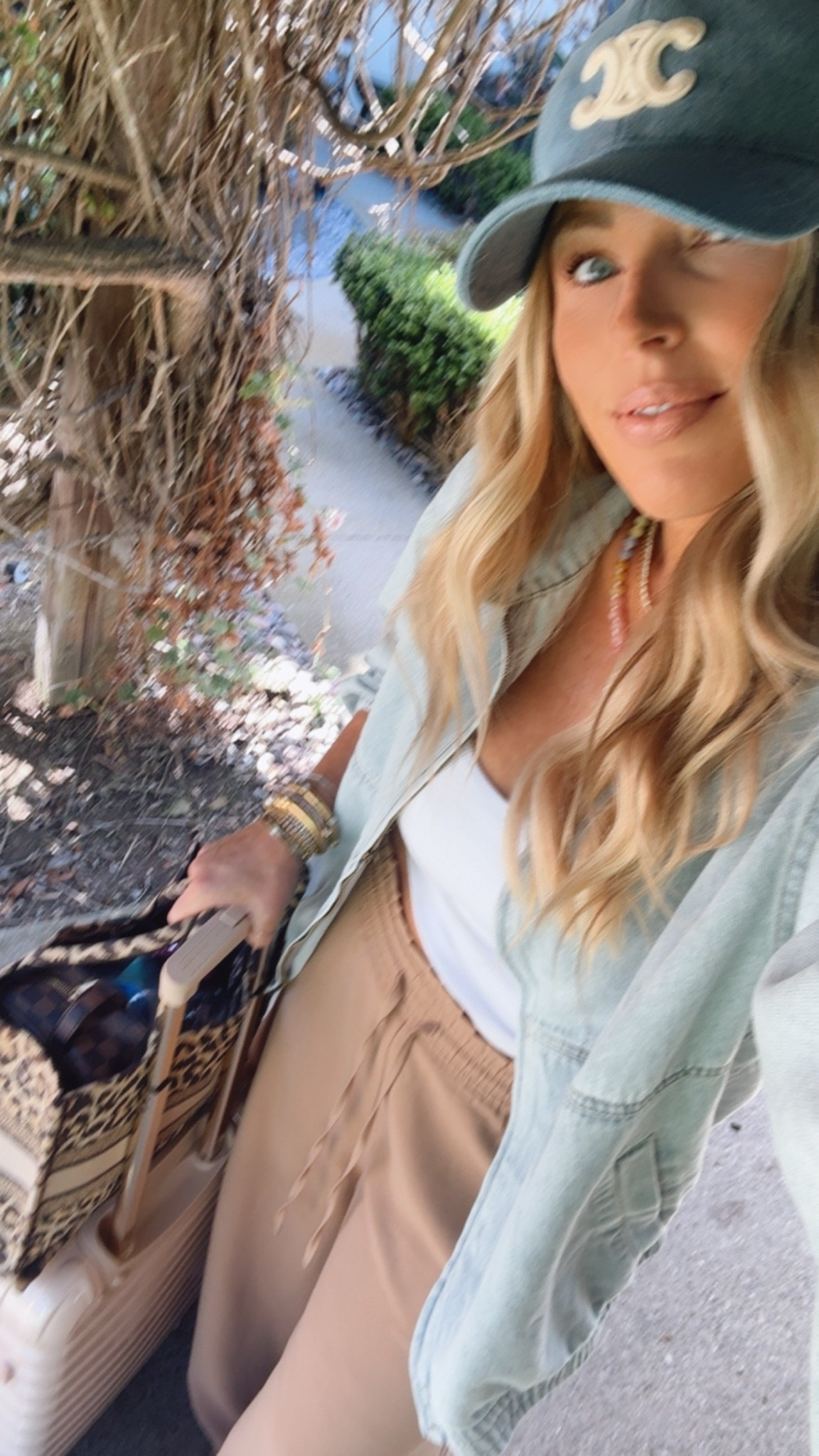 Travel outfit.  Luggage. dress. White dress. Bride. Bachelorette. Summer fashion. Beach vacation. Travel outfit track pants fit true to size and comes in petite to extra tell lengths. Wearing medium tall.

 Summer shoes. Aerie.Travel outfit. San diego . Free people.. Jelly sandals size up in between sizes. Summer sandals. Miu miu slides. Crochet. Sized up to large in tennis dress. Pickleball outfit. Summer fashion. Summer outfit. Beach vacation outfit. Jeans size down one size to 28 (normally 30. Too sized up. Swimsuit coverup. Beach vacation outfits. Dress fits true to size. Looks like zimmermann. Outfit for my son’s award ceremony. 

. Walmart. Anthropologie. Travel outfits. Vacation outfits beach. Zimmermann. Aerie. Travel outfit. Beach outfit. Linen pants. Skirt fits true to size. Graduation dresses. Graduation outfit. Wedding guest dress. Summer wedding guest. Vacation outfits. Resort wear. Summer outfits. Workwear. Mother’s Day outfit. All fit true to size. Workout outfits. Summer outfits. Madewell looks for less. Walmart fashion. 
Travel outfits. Memorial Day weekend outfit. July 4th outfits. Lake outfit. Shorts. Alo looks for less. Athleisure. Walmart. Walmart fashion. Springoutfits 2036. Workout. Sports Lon outfit. Lululemon. Freee people. Sized up one size to large in the romper for this comfy fit. White button down. Shorts. . Travel outfits. Spring fashion. 2026. Aerie. Plus
 size fashion. Vacation outfit. Spring outfits 2026. Sports outfit. Spring outfits 2026. Spring fashion. Easter. Jumpsuit. Romper. Memorial Day weekend. GRWM. Sports mom outfit

https://liketk.it/6exDp