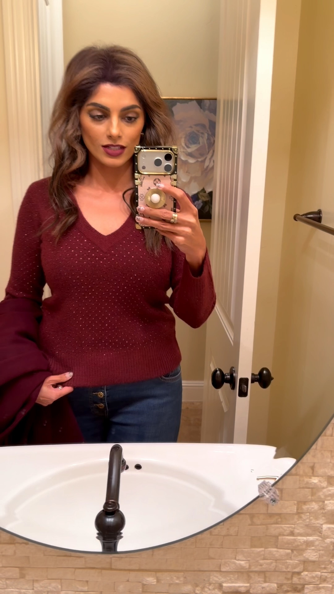 Bedazzled rhinestone sweater
Runs TTS 
Wearing small 

60% off right now!

#LTKFindsUnder50 #LTKCyberWeek #LTKSaleAlert