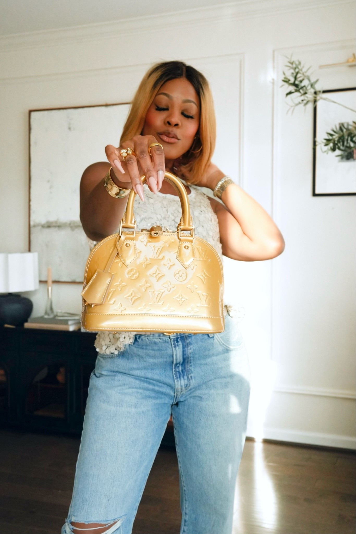 Isn’t she perfect!!! I took my new bag to an early Mother’s Day dinner and I’m obsessed with her 🤩 It’s the Louis Vuitton Vernis Alma BB in the color Mordore. She was a steal from @Fashionphile . A little Mother’s Day gift to myself! 
I’m sharing few other bags on my wishlist, so take a look and perhaps treat yourself too because you deserve it ! #FashionphilePartner #Fashionphilefinds @fashionphile #ad

#LTKMothersDay