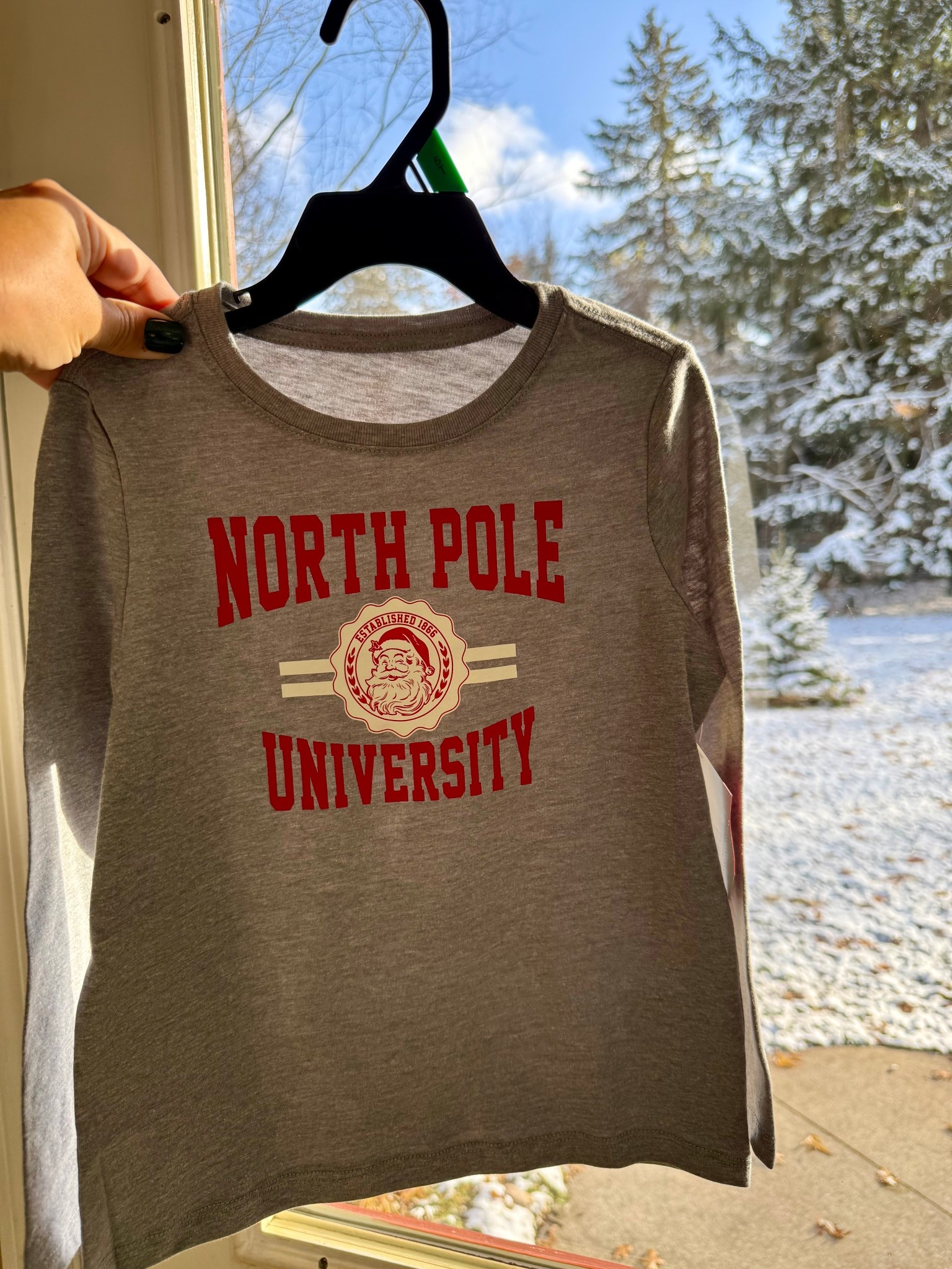 My son’s new North Pole University tee 🎅 — just $5.48!
The red one and a few other cute prints are down to $4 right now 🙌 

I realized he didn’t have a single long-sleeve tee that still fit him… preschooler going on big kid and growing way too fast 😭 #walmartfinds #holidaystyle #momlife

#LTKmomlife #LTKHoliday #LTKKids