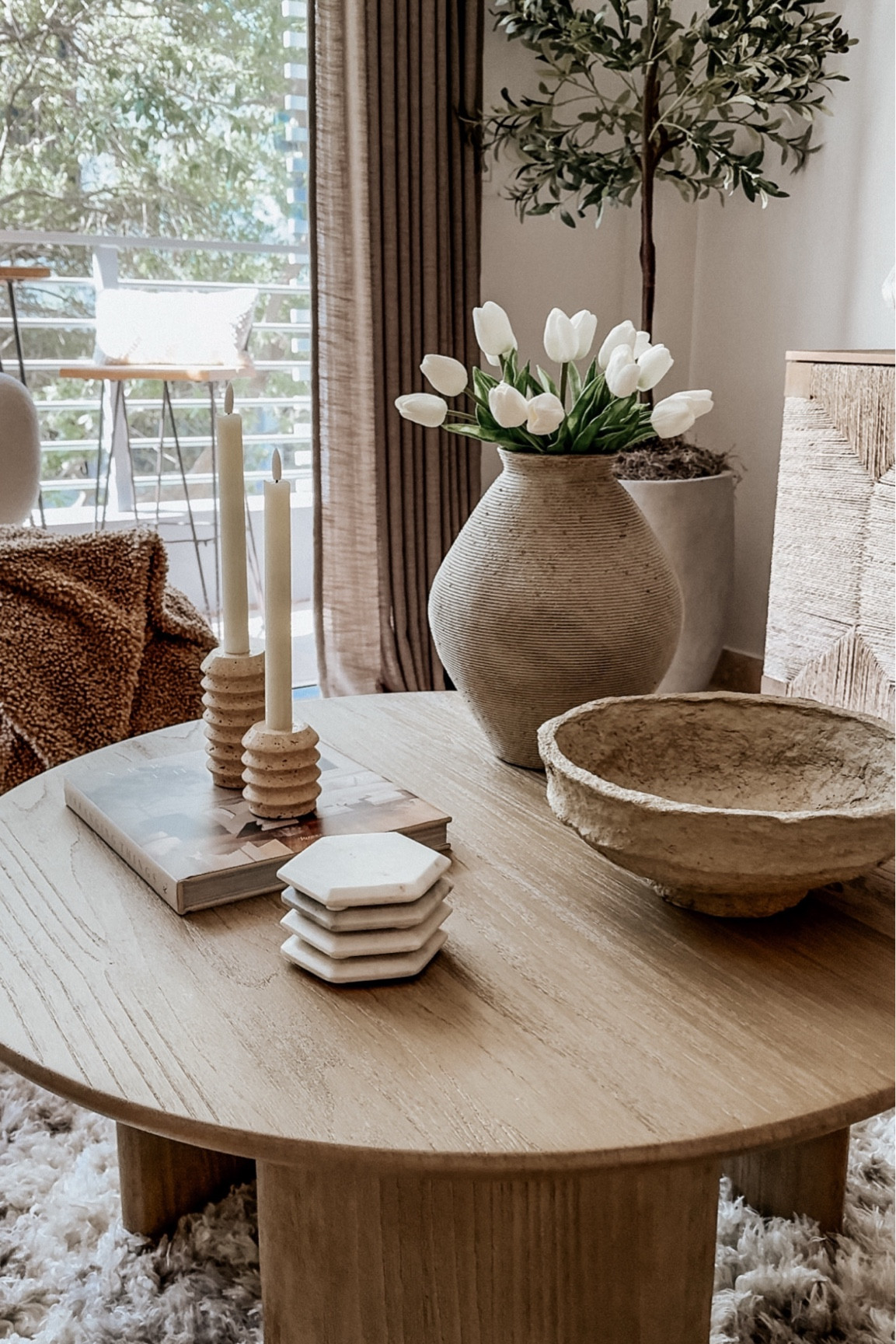 Spring coffee table styling! These are the best faux tulips! 

#LTKStyleTip #LTKSeasonal #LTKHome