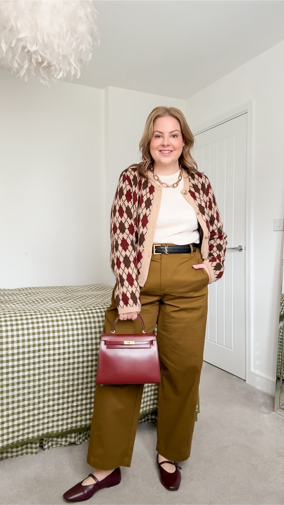 Curvy spring outfit, khaki barrel leg trousers, argyle cardigan, burgundy Mary Jane shoes 

#LTKMidsize #LTKootd #LTKSpringSale
