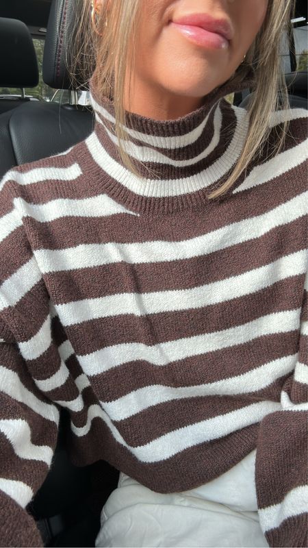 My striped brown sweater, only $25 and honestly sooo good for the price 🤎 have worn draped over my shoulders, too! In a size XL for an oversized fit 🍂🍁

Target style, fall sweaters, fall favorites, fall stripes, fall striped sweater, turtleneck sweater, sweaters under 50, affordable fashion 

#LTKfindsunder50 #LTKSeasonal