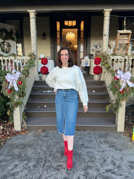 Holiday Outfit Christmas Outfits White fringe sweatshirt (size small).  Denim skirt (size 4). Red suede boots (size 8.5). #holidayoutfit #christmasoutfits #whitesweatshirt #fringesweatshirt #denimskirt #skirt #jeanskirt #midiskirt #highwaistedskirt #boots #redboots #suedeboots 

#LTKHoliday #LTKfindsunder100 #LTKstyletip