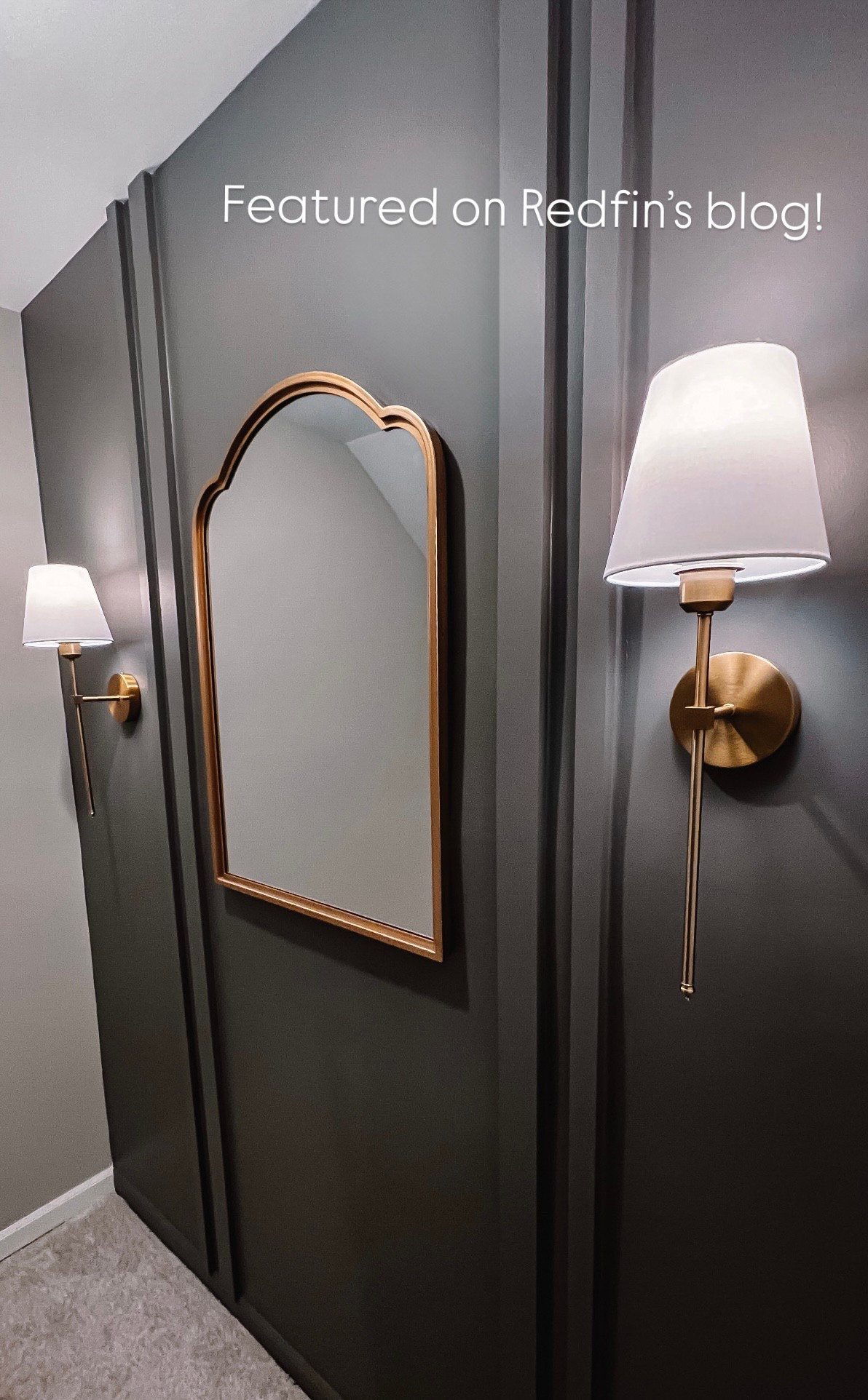 *Featured on the Redfin blog*
Decorating with brass accents is very in right now. This is the landing in my basement stairwell. Though it’s a small space, the warm accents offer a welcoming vibe against the moody darker accent wall. It’s the perfect vibe to turn on my wireless scones when we have company over.

#LTKHome #LTKFindsUnder100