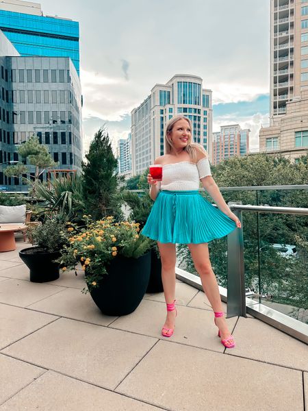 Summer rooftop vibes, summer skirts, bright colored clothes, summer outfit inspo 

#LTKfit #LTKSeasonal #LTKFind