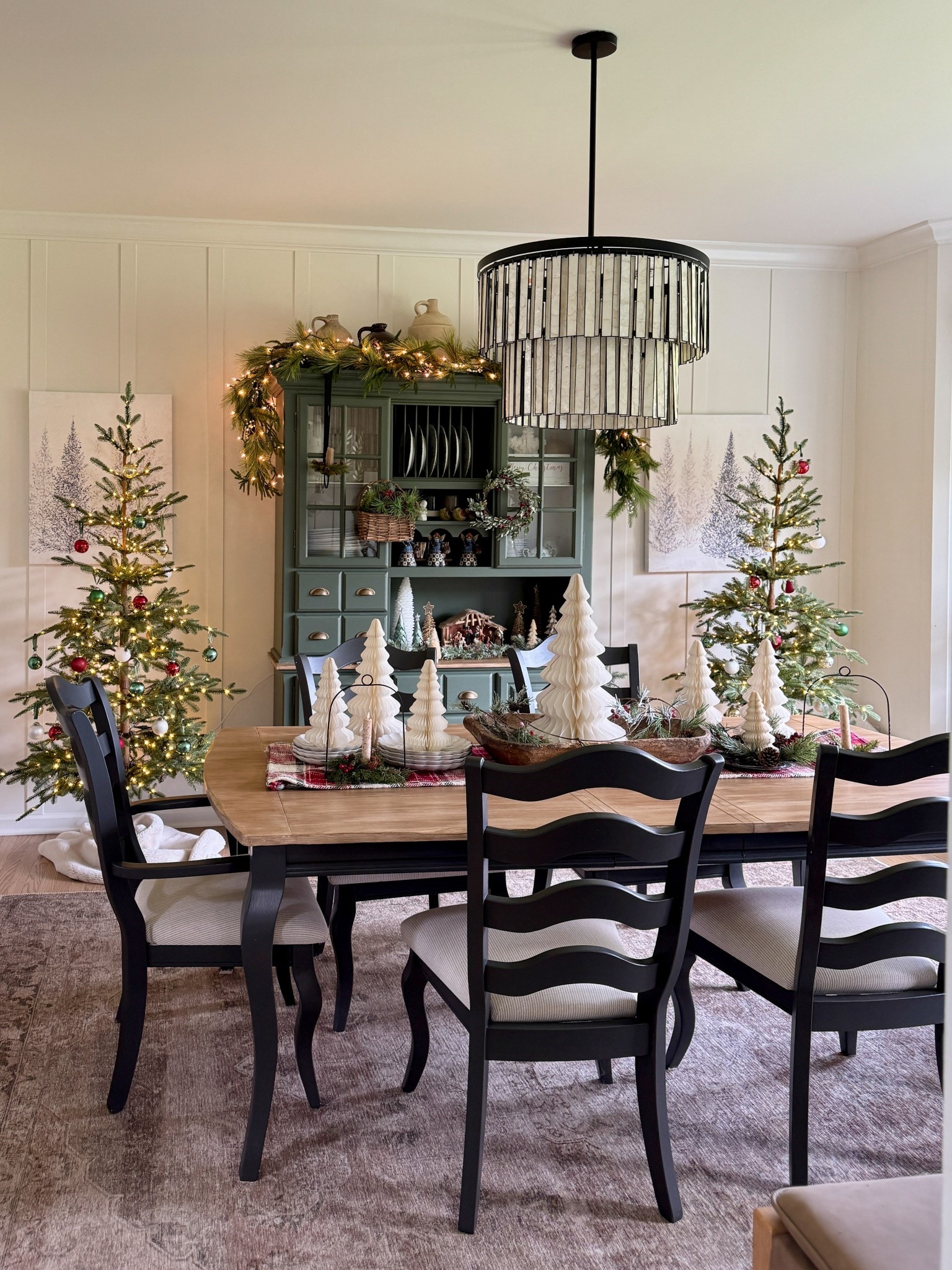 Honeycomb cream and gold edged Christmas table trees - comes in three different sizes. Monochromatic Christmas tree canvas prints. Real touch cypress garlands set of two. Capiz Chandelier. Similar alpine fir Christmas trees. Mine are from Balsam Hill and are the prelit 6’ Alpine Balsam Fir trees. Use code Dina50 for $50 off your order of $250 or more  

#LTKSeasonal #LTKHome #LTKFindsUnder50