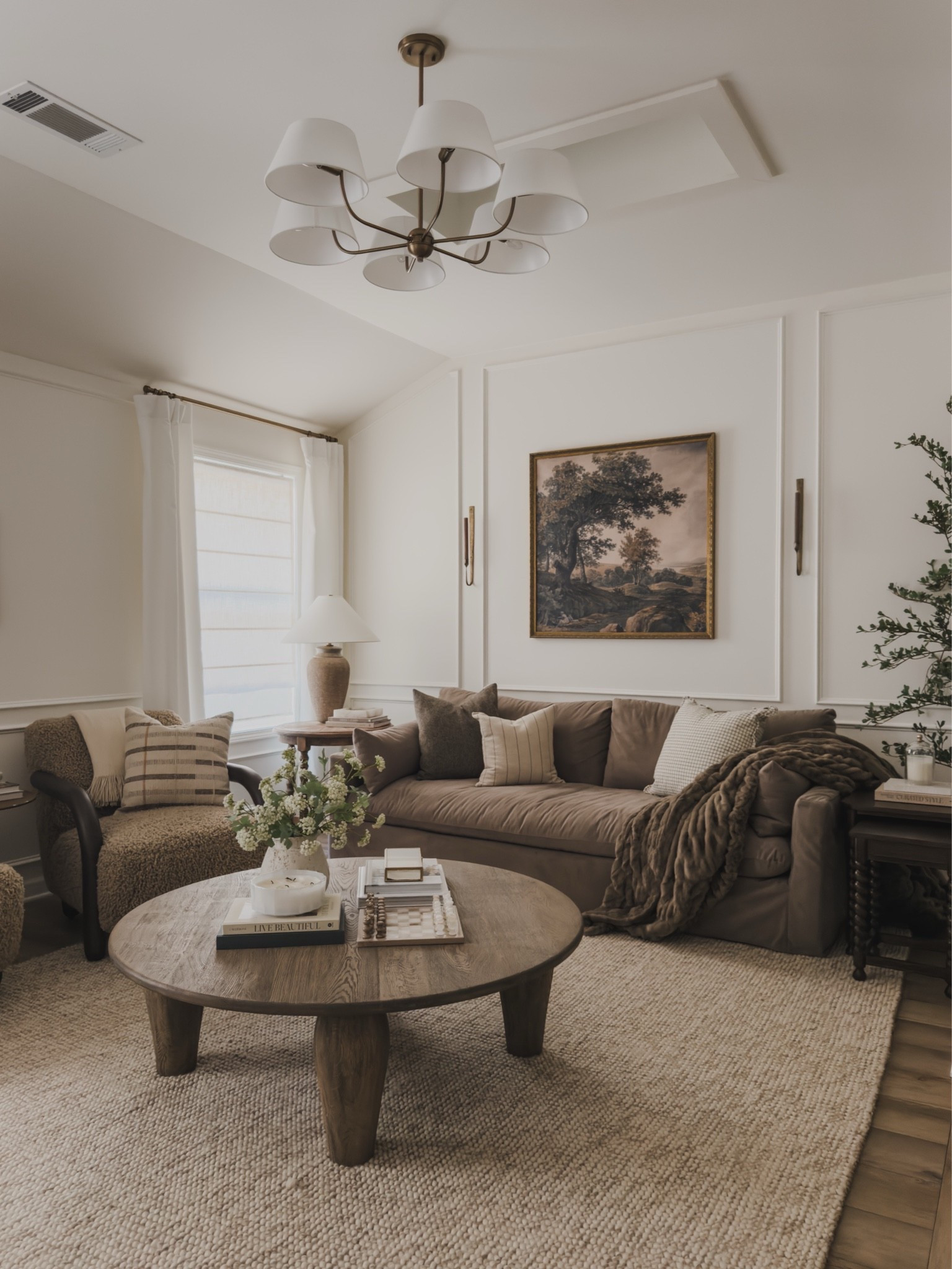 Sharing all of the cozy, early fall transition details in my media room! Adding in plenty of cozy textures and layers, natural elements, and warm lighting for a timeless look.

Home finds, neutral home inspo, early fall transition, neutral wood tones, furniture favorites, media center refresh, fall refresh, cozy lighting, brass detail, collected style, linen details, round coffee table, sofa details, table lamp, accent chair, Etsy, Wayfair, Birch Lane, Loloi, Perigold, Magnolia, found it on Amazon, Lola Blanket, Two Pages, shop the look!

#LTKSeasonal #LTKHome