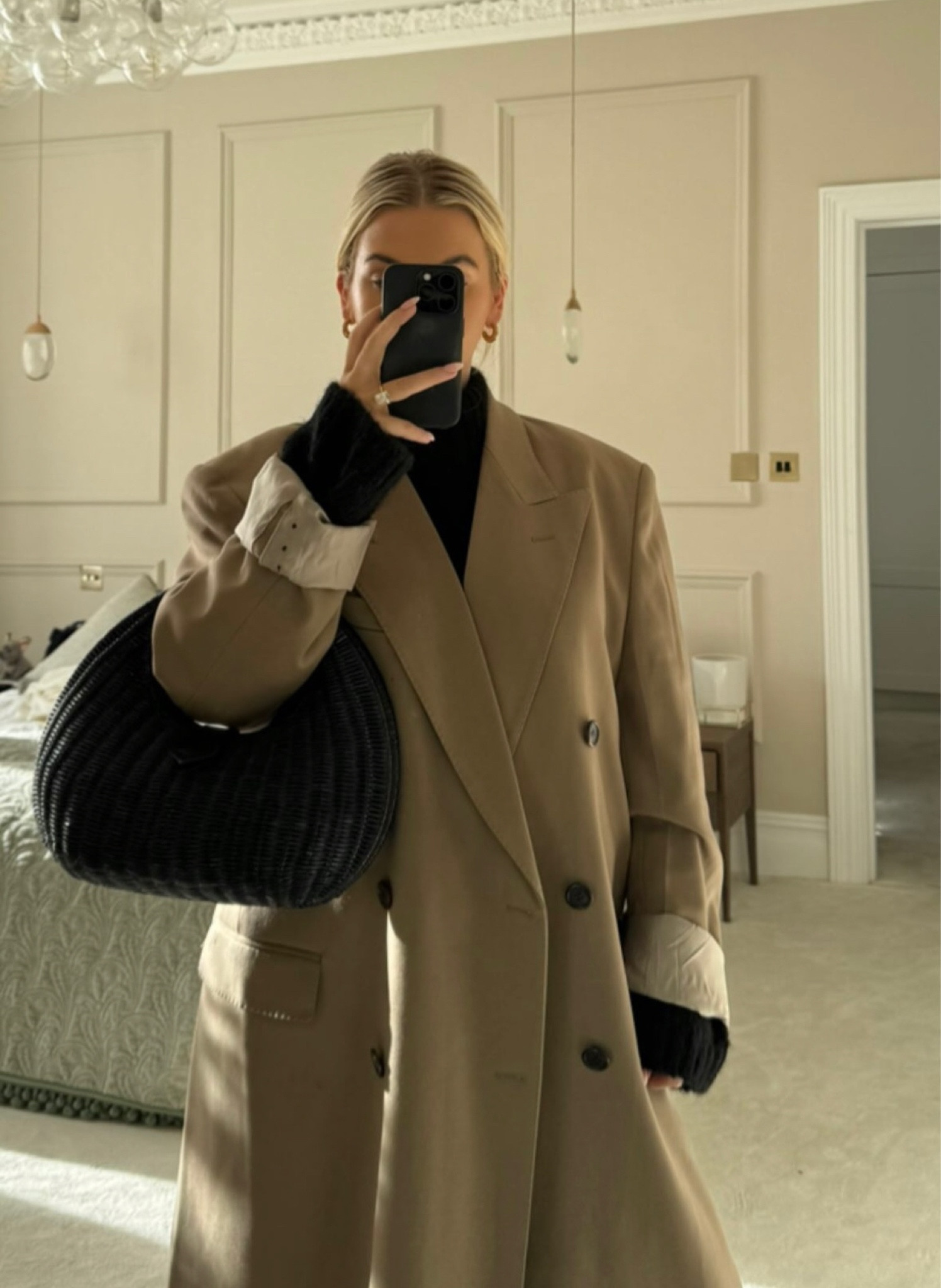 Long beige coat, black leather handbag, roll neck long sleeve jumper

#LTKeurope #LTKSeasonal #LTKstyletip