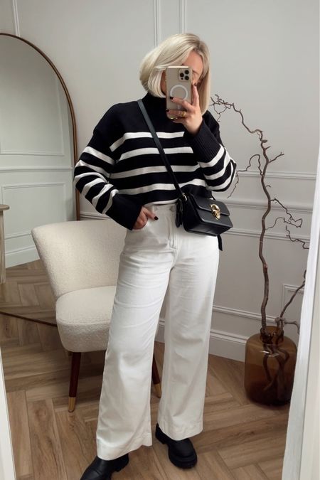 A simple way to wear white jeans in autumn. Pair them with a black and white striped jumper, black chunky boots & a chic black crossbody bag like this one from coach  

#LTKeurope #LTKstyletip #LTKSeasonal