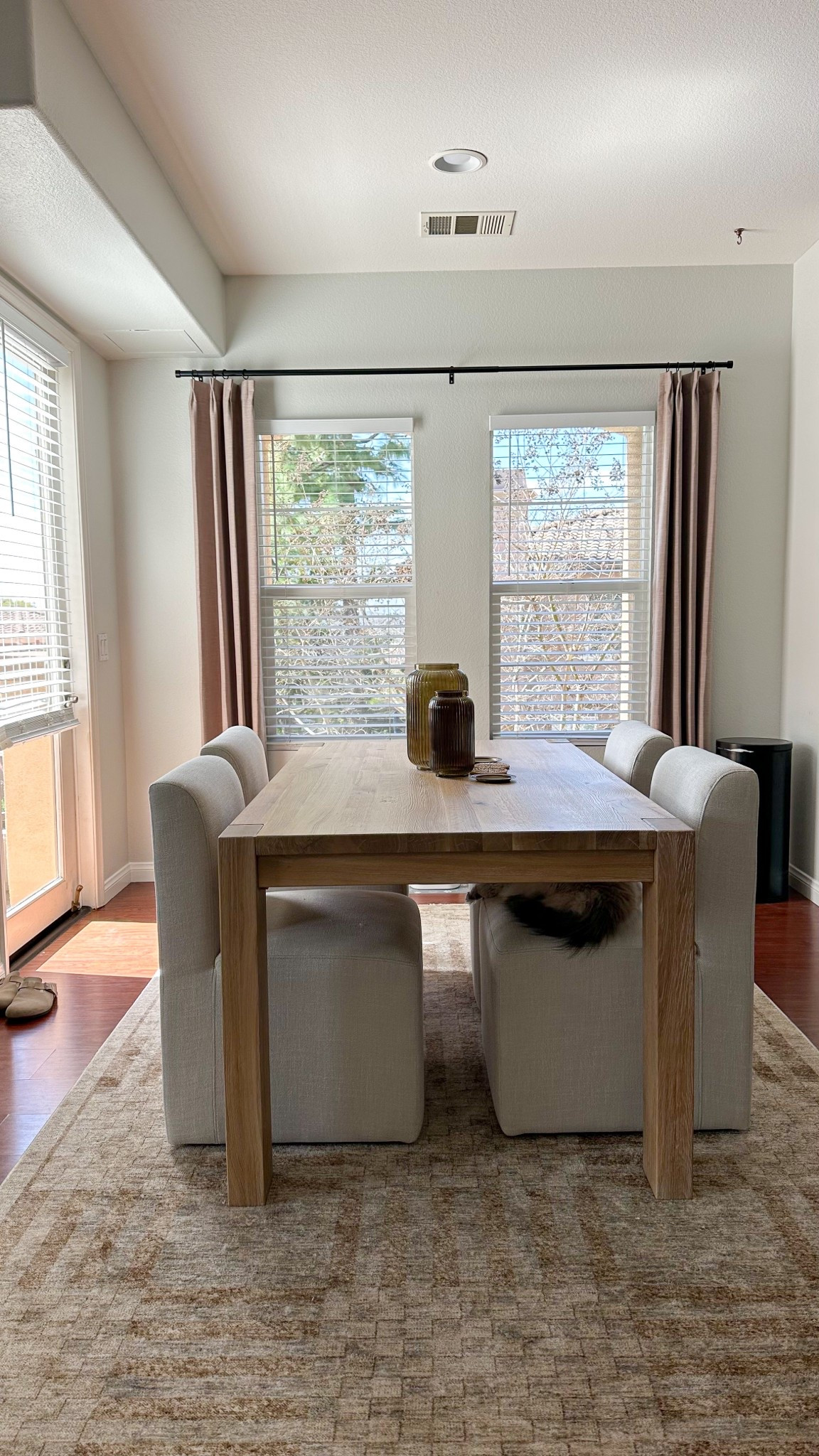 Rug is Joonloloi 😍 dining room rolling dining chairs, neutral pleated curtains

#LTKHome