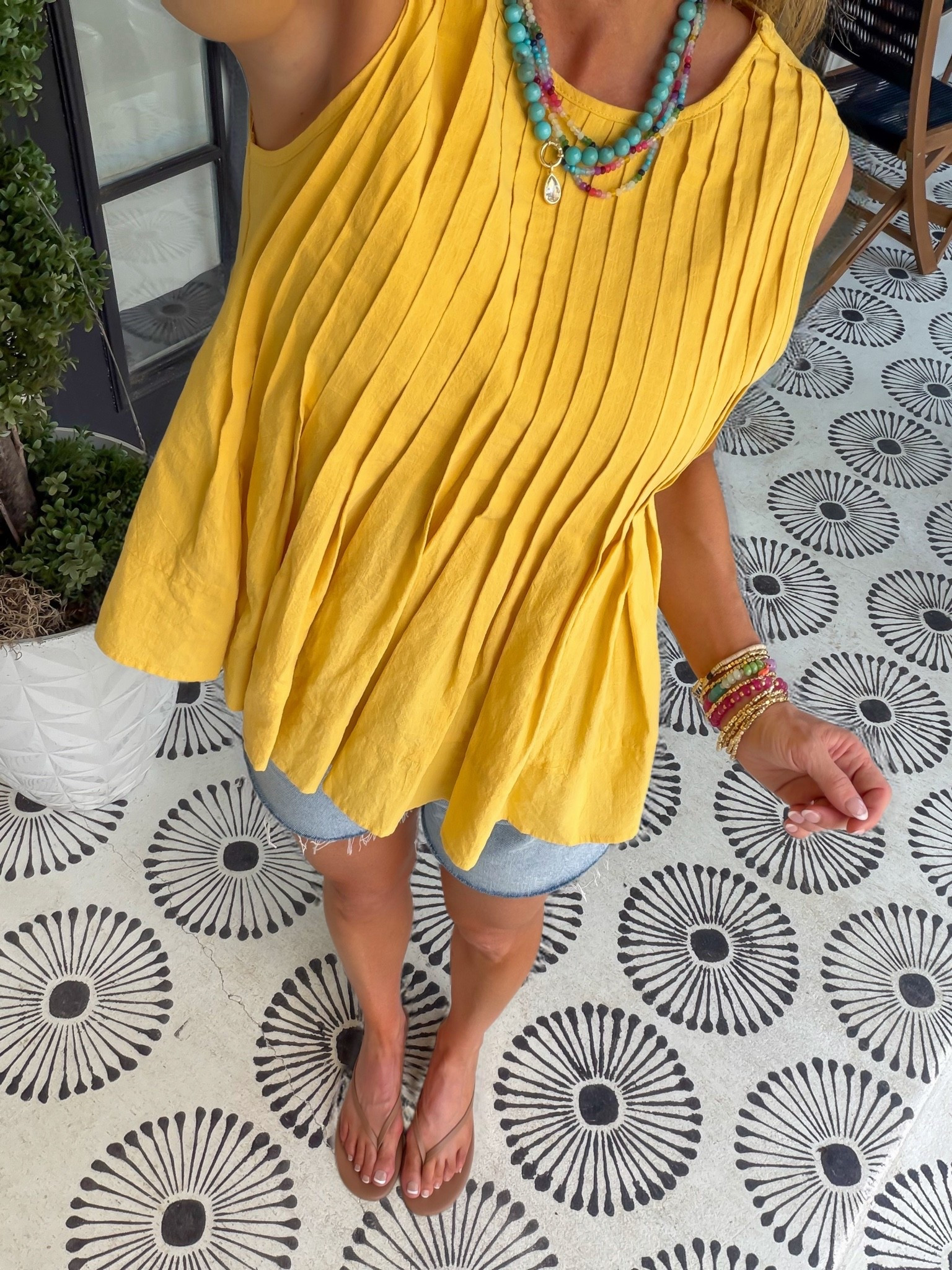 Ootd for early dinner. 

Amazon tops, sleeveless yellow flowy top, denim cutoff shorts, beaded necklace, beaded bracelets, sandals, casual shorts outfits, summer outfits

#LTKdayinmylife #LTKootd #LTKOver40