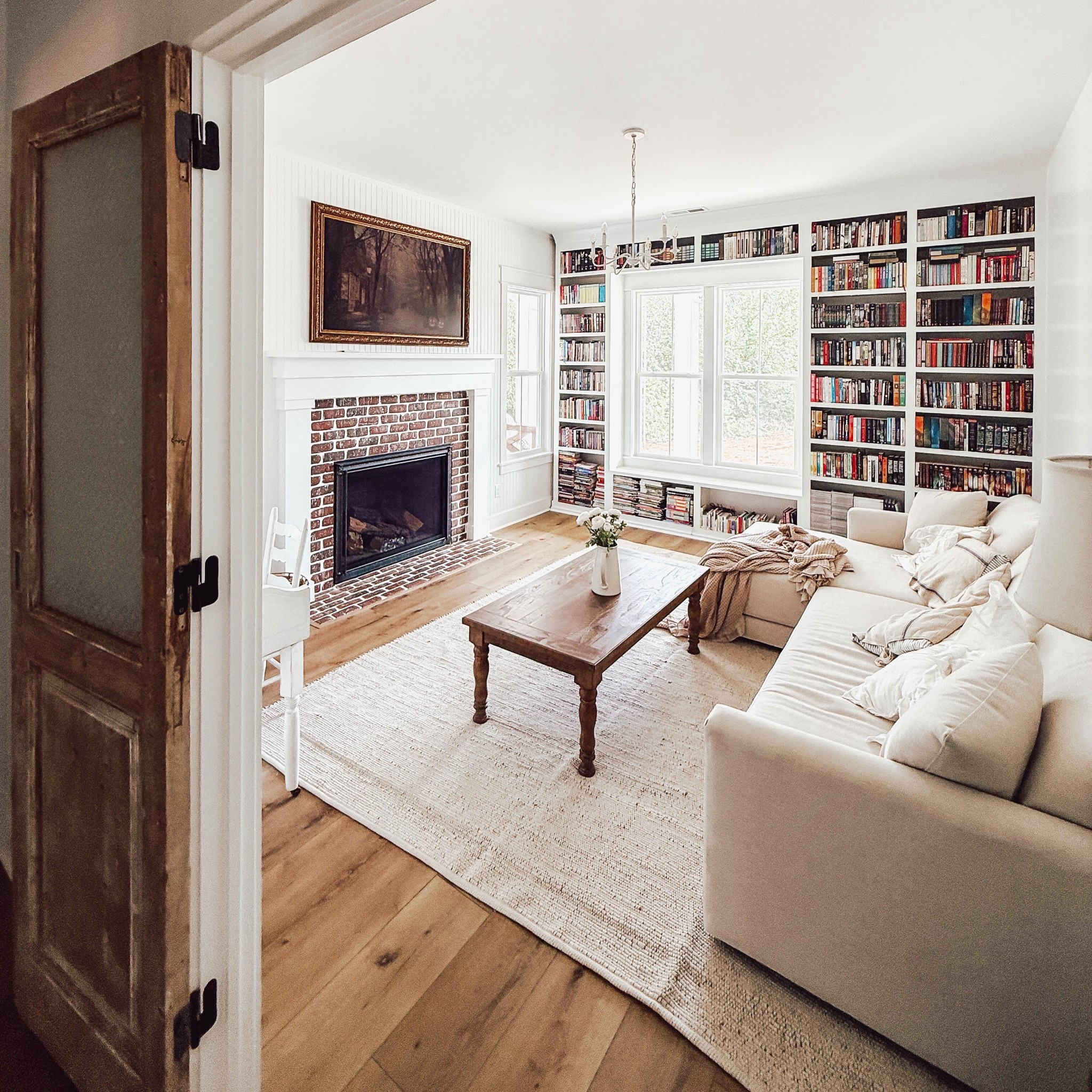 Cozy home library 
#deepsectional #crateandbarrelcouch #frametv #frametvframe #framefortv 

#LTKHome