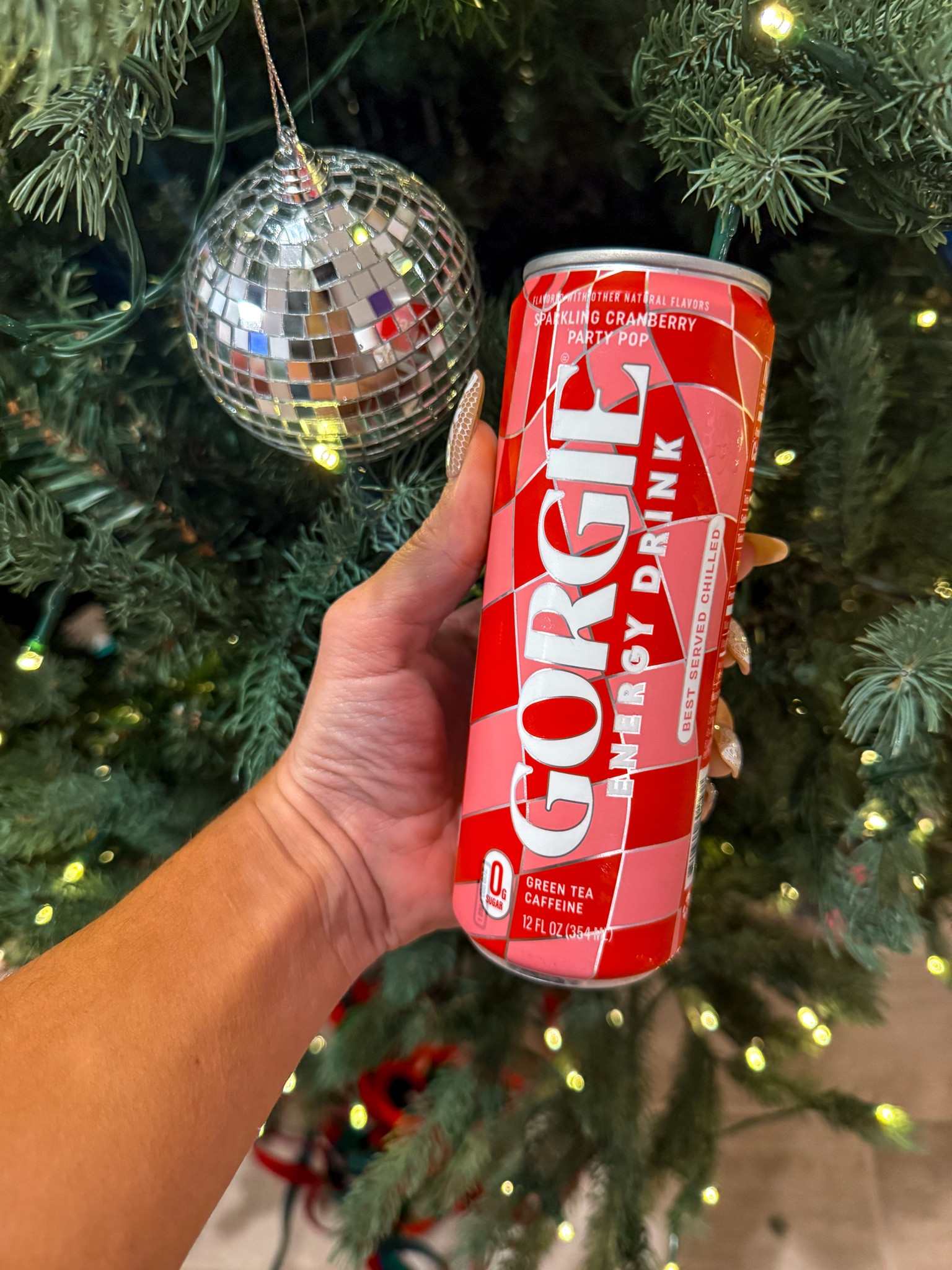 Ho Ho Hello Gorgie! ♥️🪩🎄
Loving the new holiday flavor Sparkling Cranberry Party Pop from Gorgie! Our fav energy drink that uses green tea caffine & is super delish! 
#GetGorgie #EnergyDrink #HolidayDrinks 

#LTKfoodie #LTKselfcare #LTKHoliday