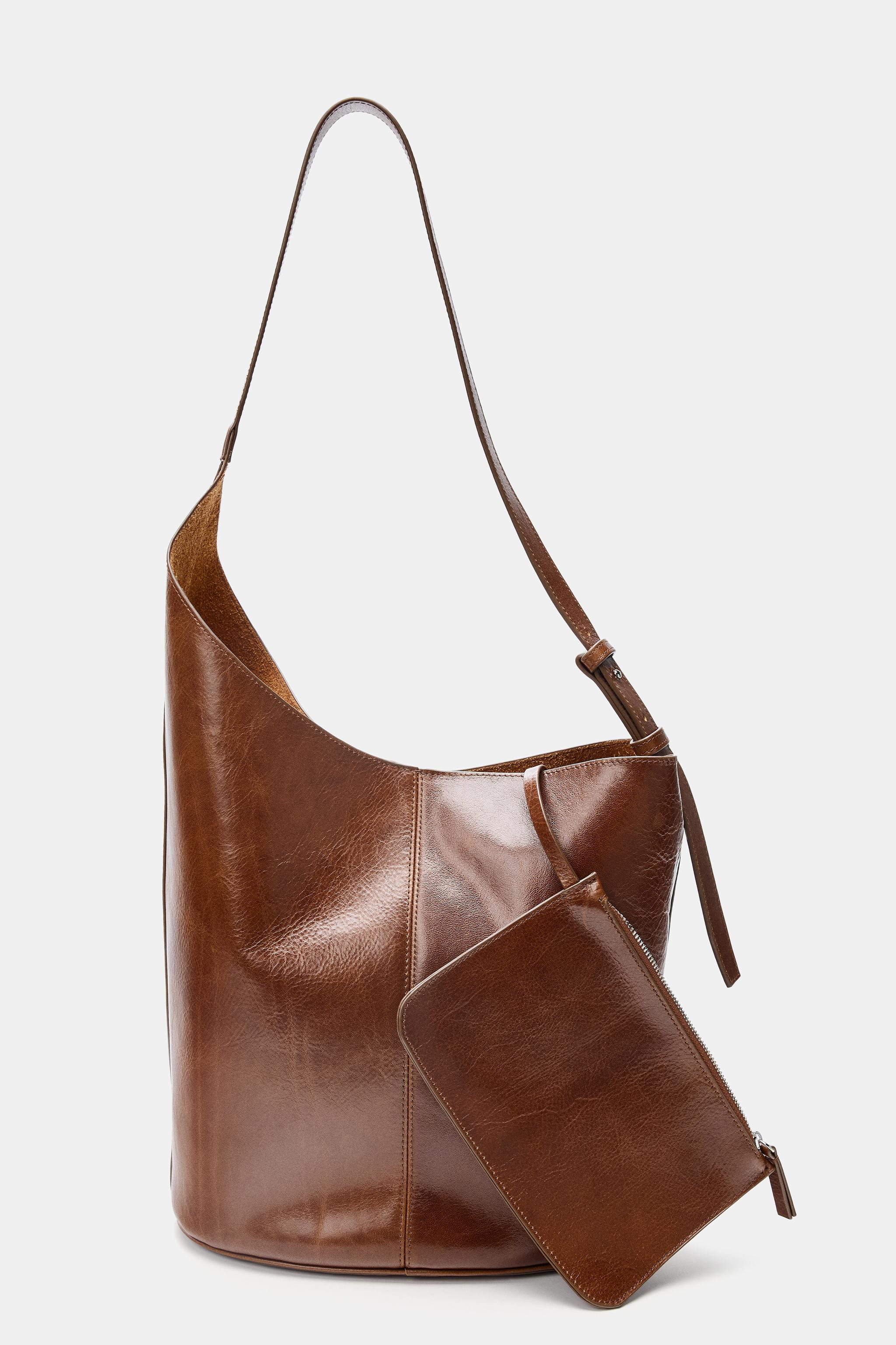 ASYMMETRIC LEATHER BUCKET BAG139.00 GBP Brown BlackBrown | 6041/610/700Put it in your basketAddAs... | Zara UK