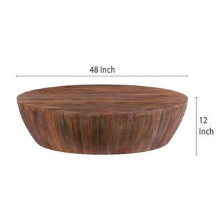 Arthur 48 in. Brown Round Mango Wood Handcarved Coffee Table | The Home Depot