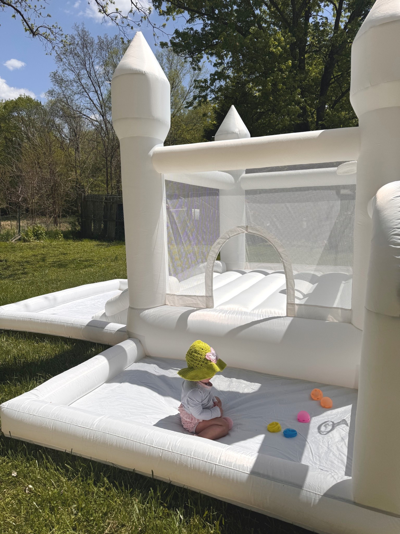 Gorgeous weather called for a backyard afternoon well spent ☀️

My 1.5-year-old is very active right now—and fully in her “climb on everything” era—so we surprised her with a bounce house, and it’s been the best decision. After going down a deep internet rabbit hole, I chose this one for the extra jumping space, built-in ball hoop, and splash pad feature that can double as a mini pool, ball pit, or water play area.

I love how versatile it is—it’s something we’ll be able to use all spring and summer long, and it keeps her entertained for hours.
It’s currently on sale (which rarely happens 👀), so now is the time to grab one. I’m also linking a few similar options I considered at different price points and age ranges!
#LTKhome #LTKfamily #LTKkids #LTKsalealert #LTKfinds #LTKunder100 #LTKspring #LTKsummer #LTKmomlife #LTKstyle

#LTKSwim #LTKdayinmylife #LTKMothersDay