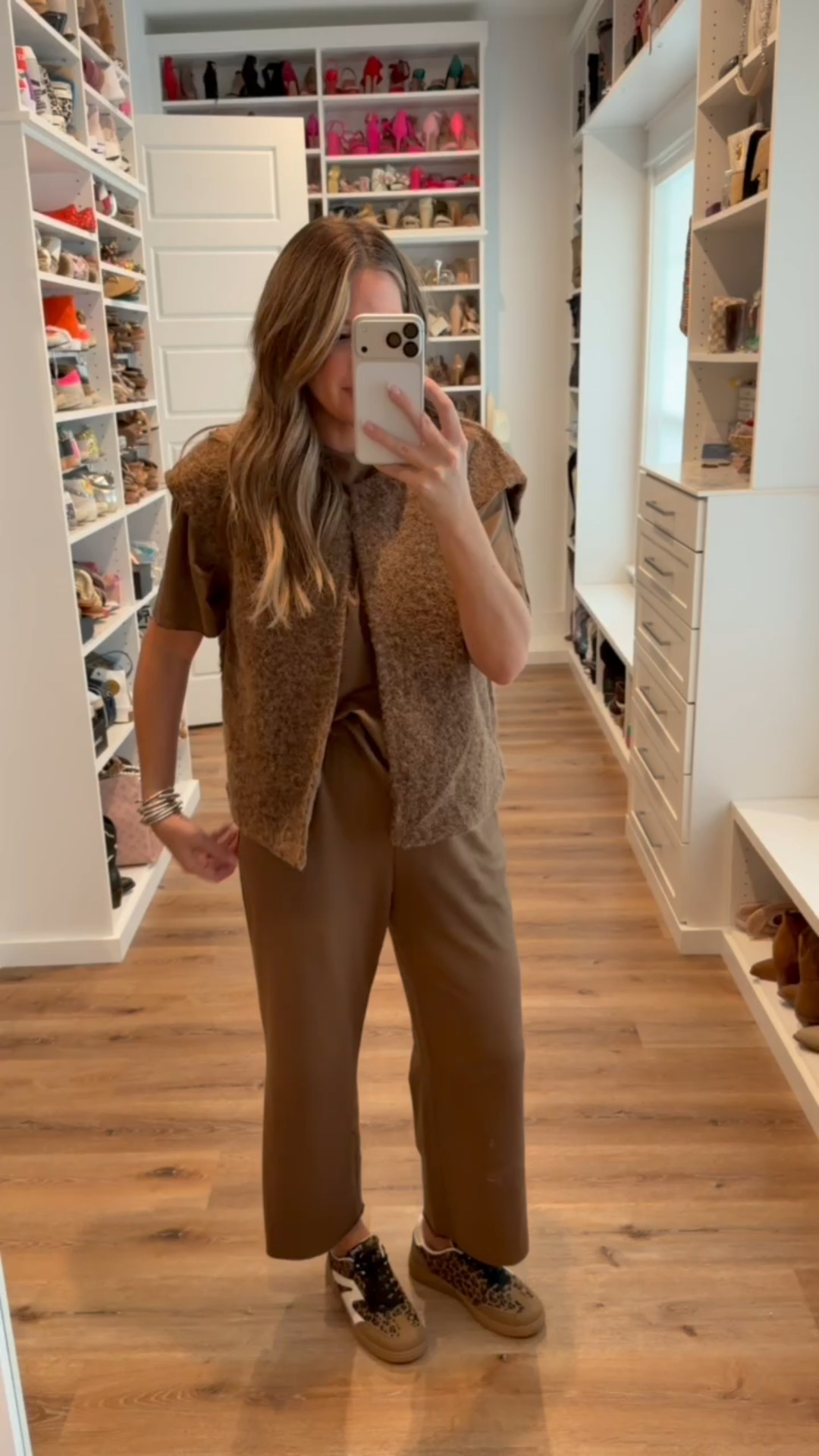 In a medium vest, medium 2 piece set, sneakers and accessories- fits tts.

#LTKStyleTip #LTKSeasonal #LTKFindsUnder50