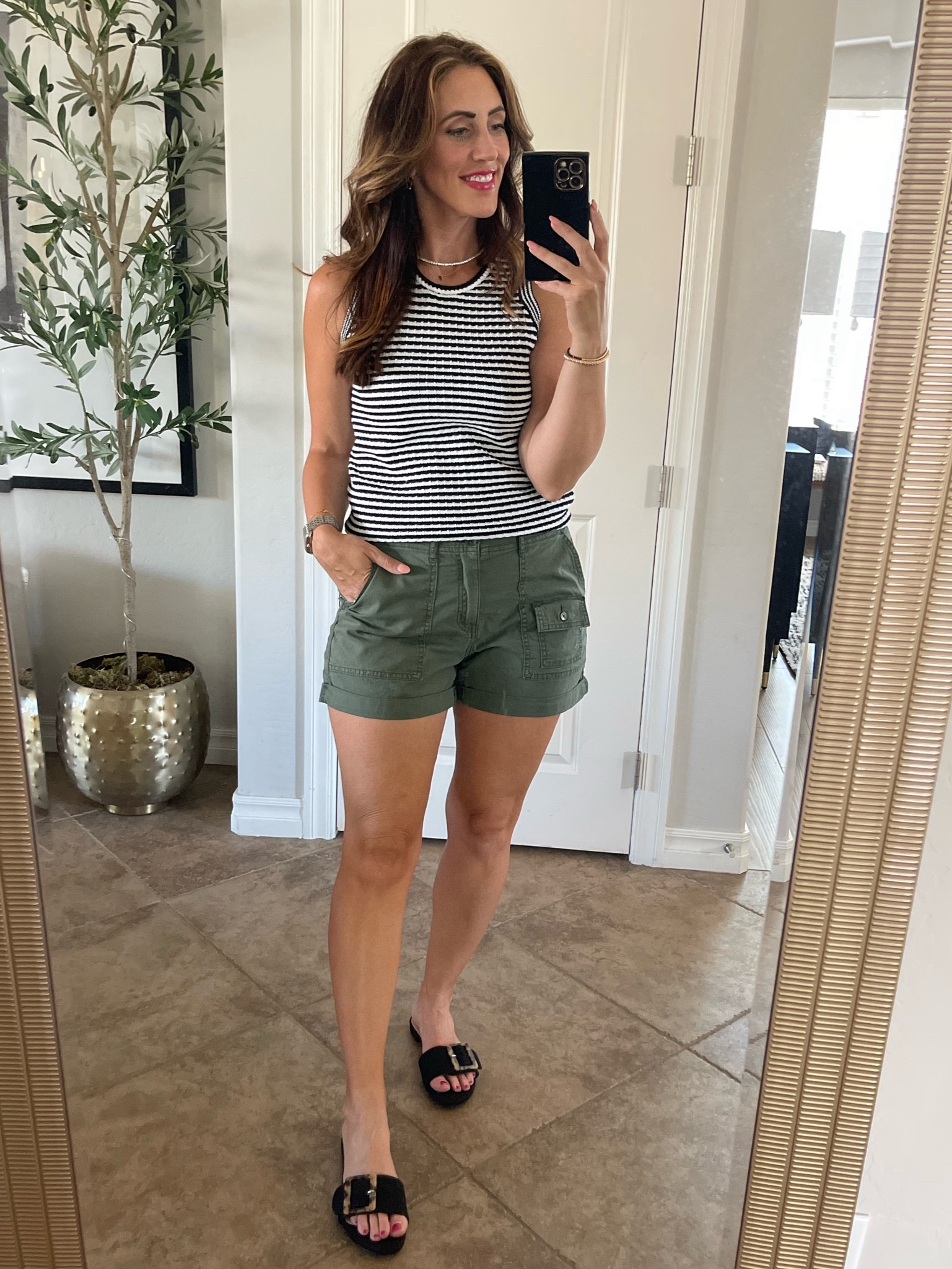 Striped sweater tank (size small) 
olive green, utility shorts (size 6) - perfect length! 

Spring or Summer outfit idea 

#LTKsalealert #LTKfindsunder50 #LTKstyletip