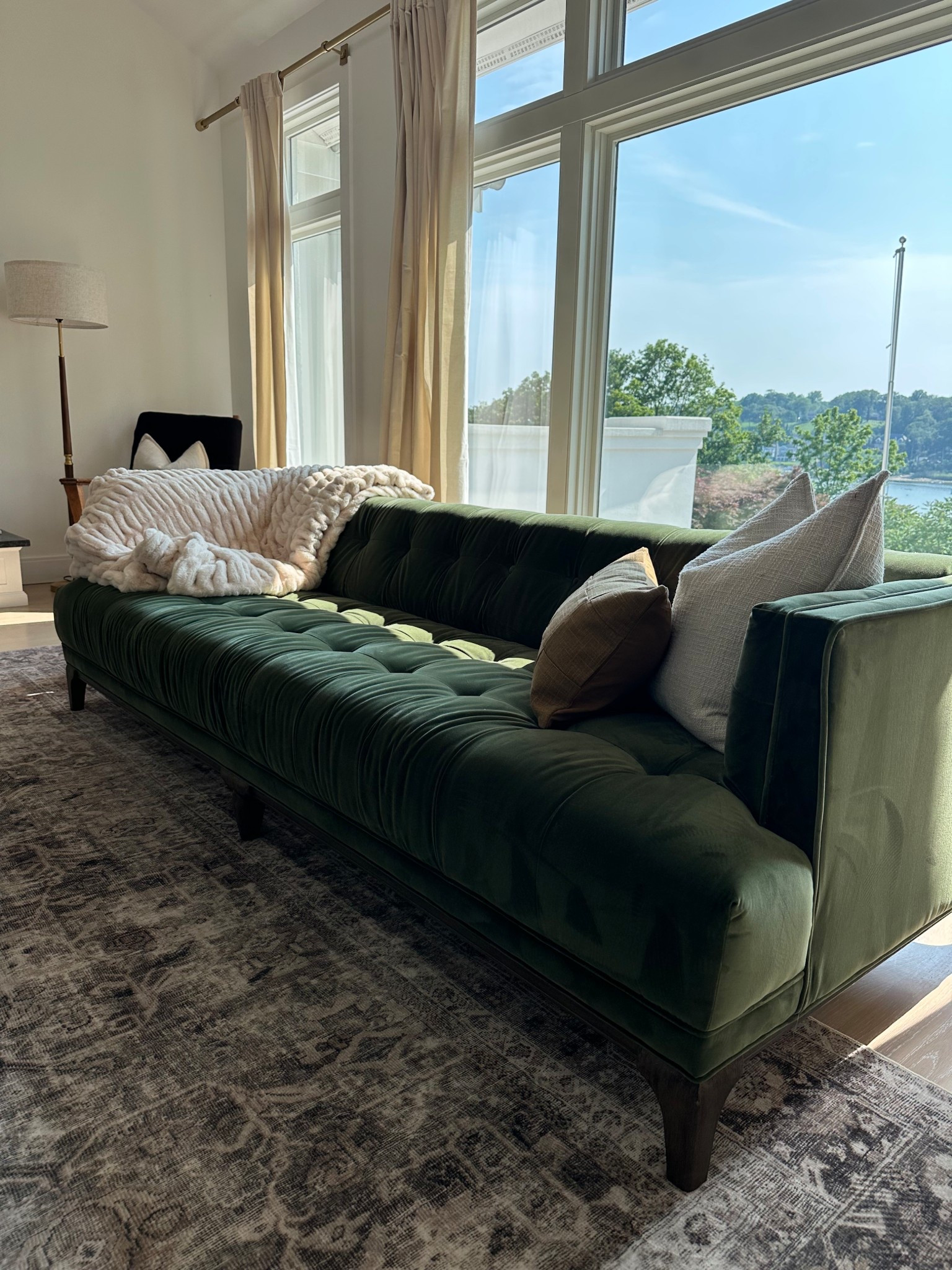 This couch adds such a fun pop of color to this space! 💚

#LTKHome #LTKStyleTip