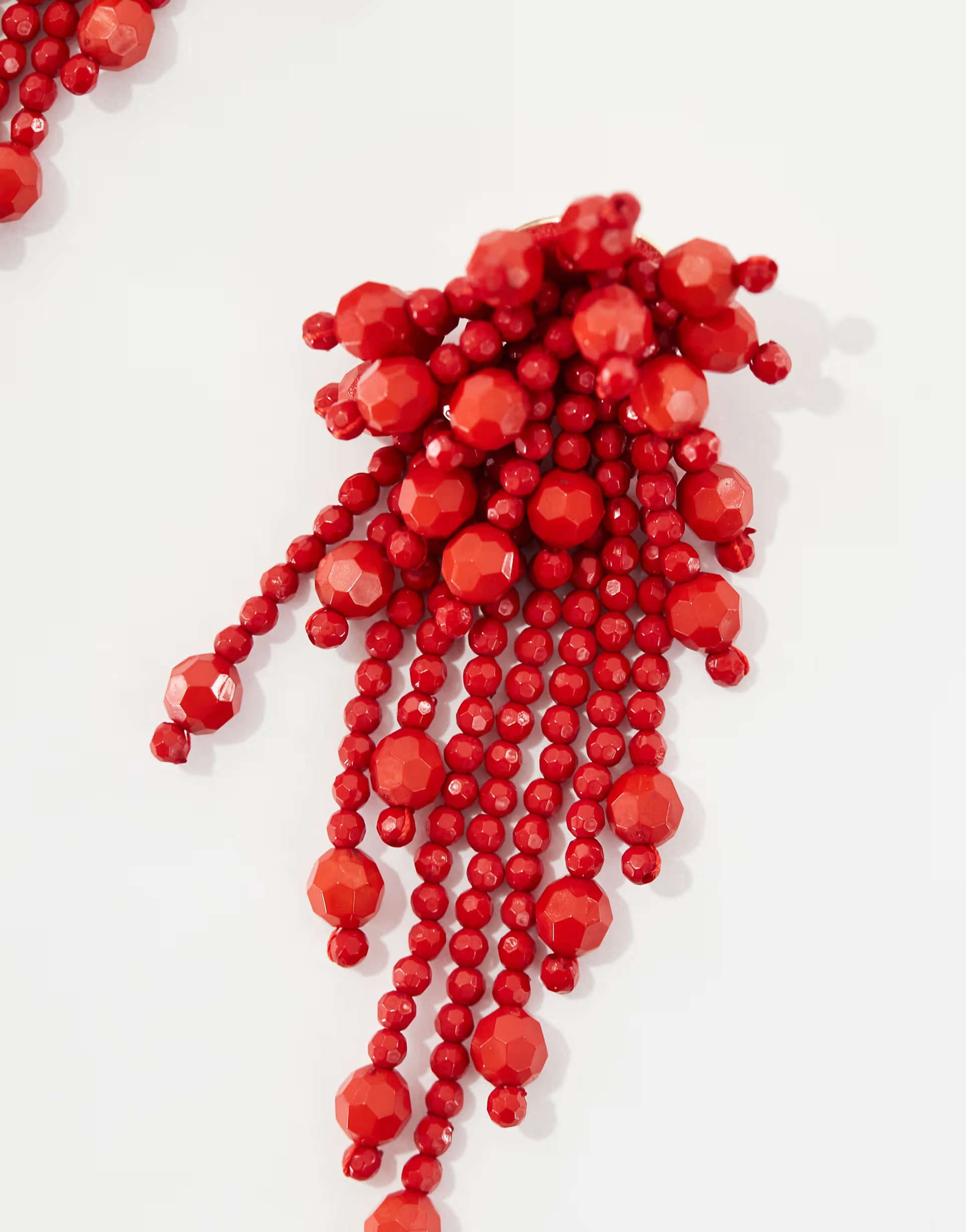 ASOS DESIGN drop earrings with waterfall bead detail in red | ASOS (Global)