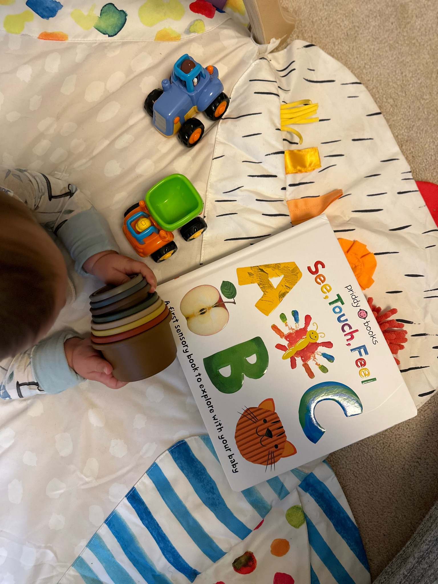 this morning’s toy lineup 

baby toys, baby books, toddler books and toys, nesting cups, baby toy trucks

#LTKKids #LTKBaby