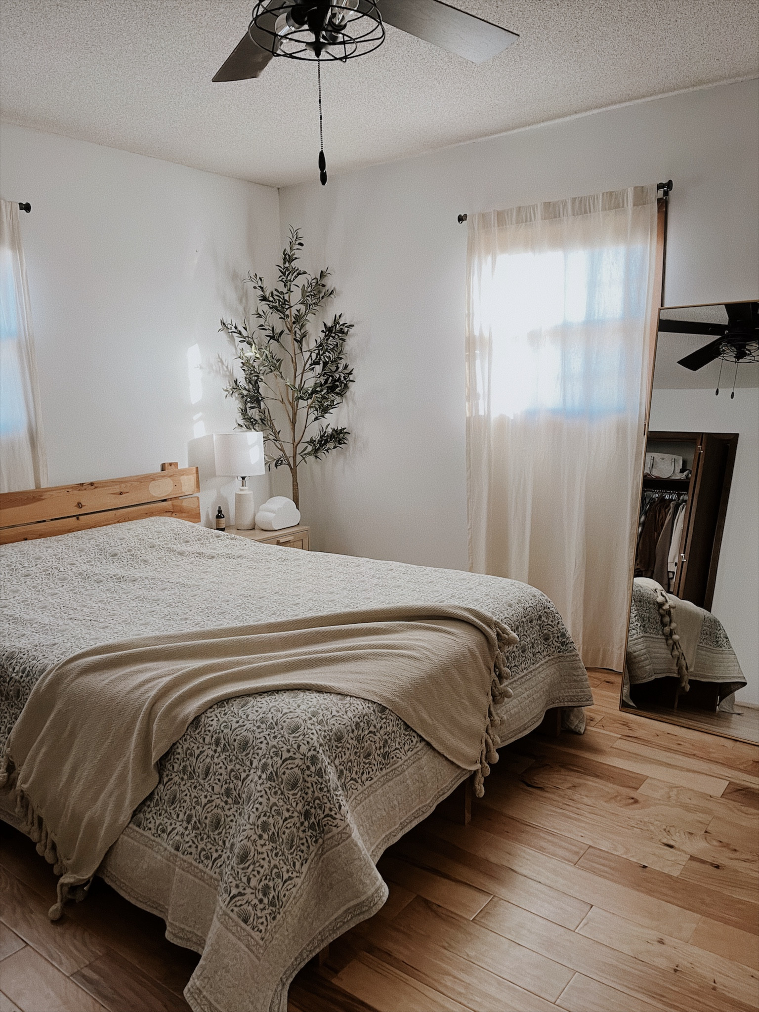 Spring bedroom refresh for mom + dad! Keeping it minimal since we have a small room, but I added in some earthy green tones for a cozy feel 🧺🌷

#LTKhome #LTKfamily