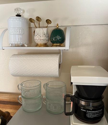 My coffee bar in my compact studio kitchen ☕️ 
Utilizing space is so important! So I love this paper towel shelf from Amazon and fun coffee cups and coffee jar  

#LTKFindsUnder100 #LTKHome