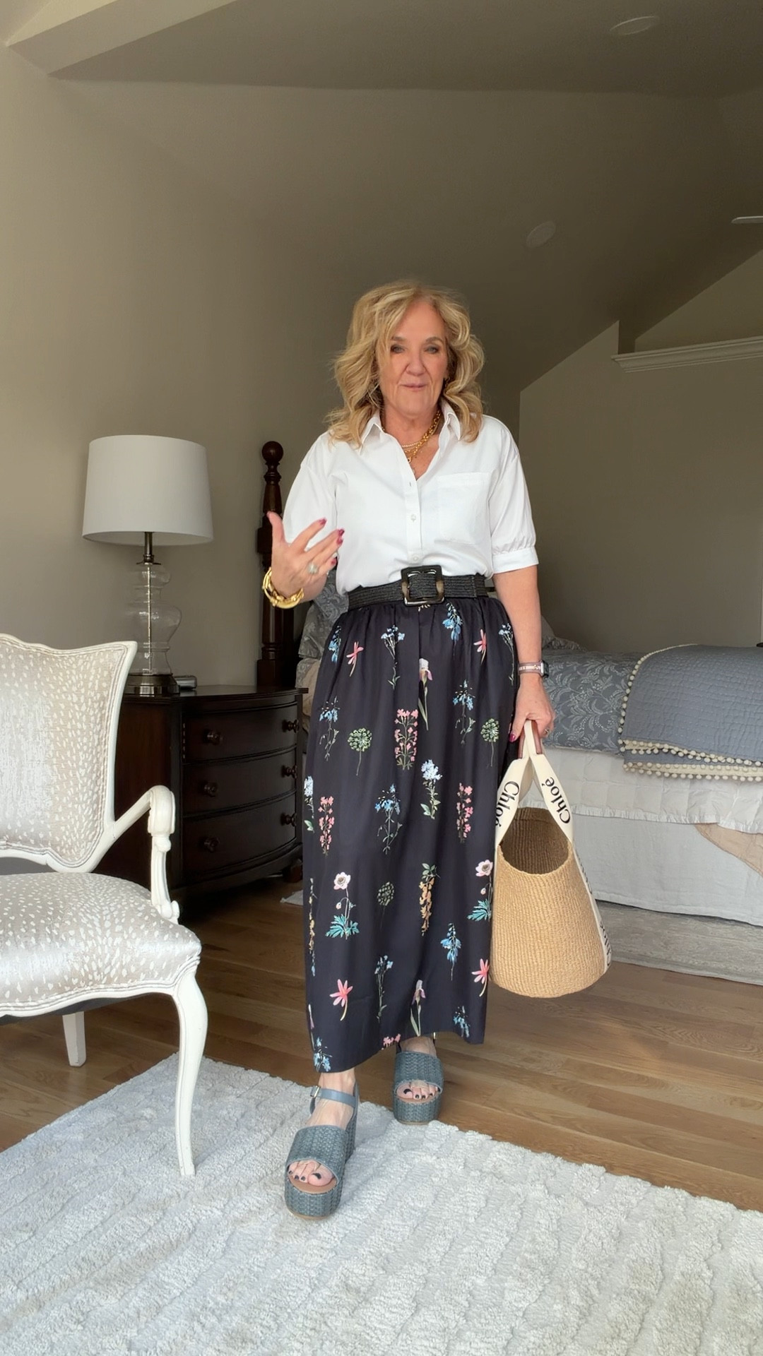 Split up the two-piece set by wearing the skirt all on its own. I love this new iron blouse. That’s currently on sale from Chico’s. I’m wearing a 1.0.
The skirt is part of a two piece set. I’m wearing the medium.
I’ll link a few more affordable price points in a basket tote. But I do love this design designer one.
Platform shoes are by Walmart. I’m normally a 9.5 and these are a nine. And they were great.
My belt is from LOFT last year. I’ll link some similar.

Vacation outfit, spring outfit, spring skirt, black floral skirt, white blouse, elbow length blouse

#LTKOver40 #LTKWorkwear #LTKTravel