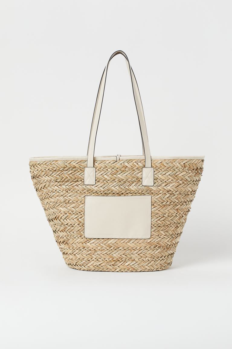 Sturdy bag in braided straw with imitation leather details. Two handles and ties at the top and a... | H&M (UK, MY, IN, SG, PH, TW, HK)