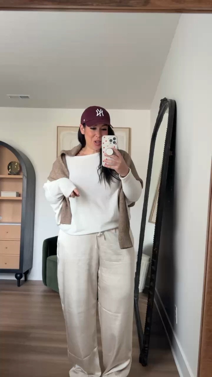 How I styled my outfit today! Satin pants from @abercrombie are super on trend, comfortable and currently 25% off with my exclusive in-app code! Styled with this adorable @Express top and @American Eagle Outfitters Yankees baseball cap! 💗🫶🏻

#LTKSpringSale #LTKMidsize #LTKootd