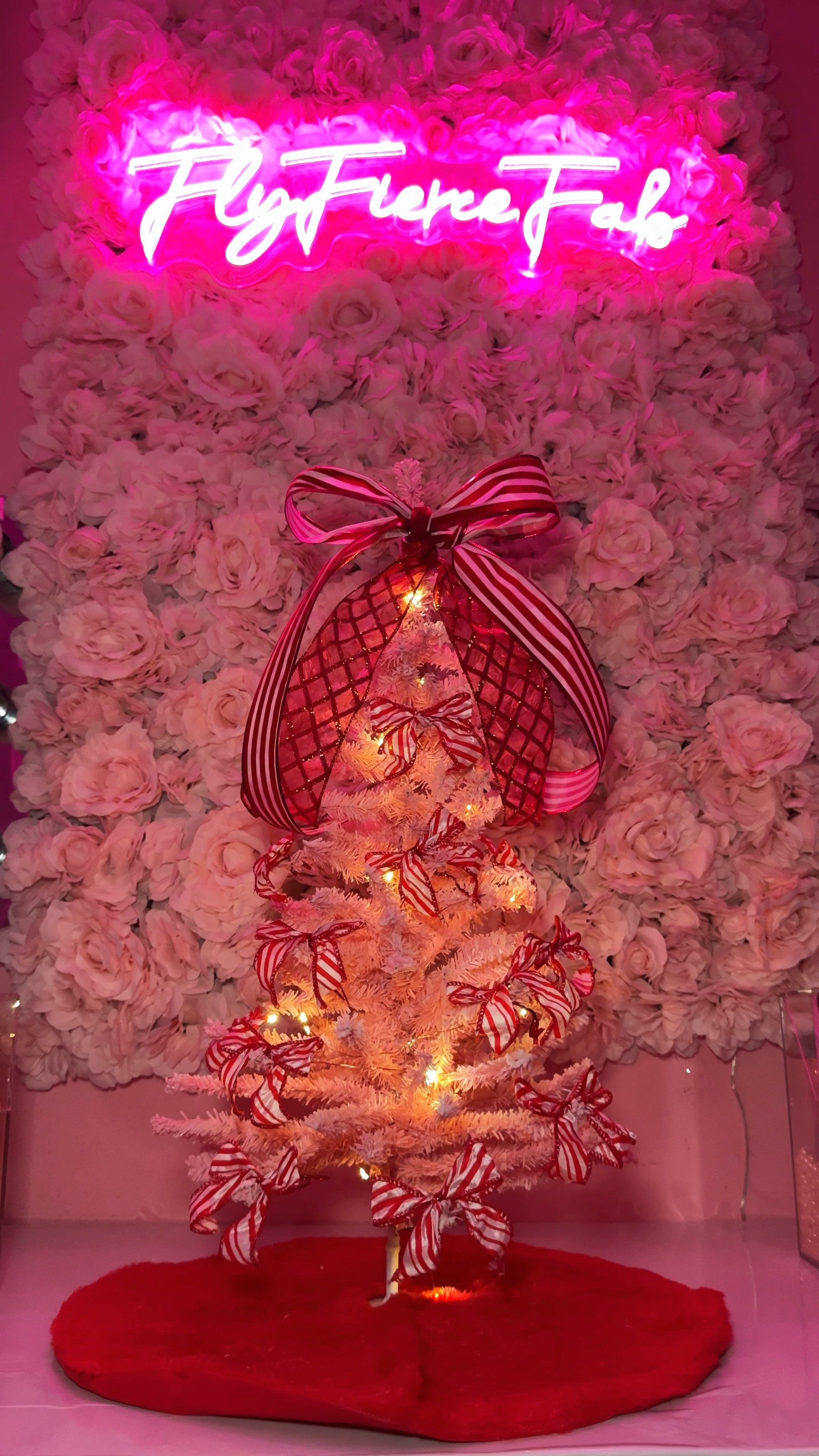 Decorate my pink Christmas tree with me! 🎄🎀✨ I’m reusing my mini pink Christmas tree that I got last year from Hobby Lobby, and going with a candy cane theme to match the rest of my Christmas decorations ❤️.

I wrapped my tree with mini twinkle warm white fairy lights that I got from Target ($5!), and tied a huge bow on top of my tree, using the candy cane ribbon and the red plaid glitter ribbon from my other holiday decorations 🎅🏾🦌✨.

I found this red faux fur mini Christmas tree skirt at Walmart for $5.98 (which actually covers a large amount of space), and added two packs of mini candy cane bows ($2.98 each!). 

I like that these bows have wire in them, so it allowed me to mold them which elevates the look of the bows 🎀.

I think my mini Christmas tree looks so cute on top of my vanity 😍🎄


#LTKWatchNow #LTKHome #LTKHoliday