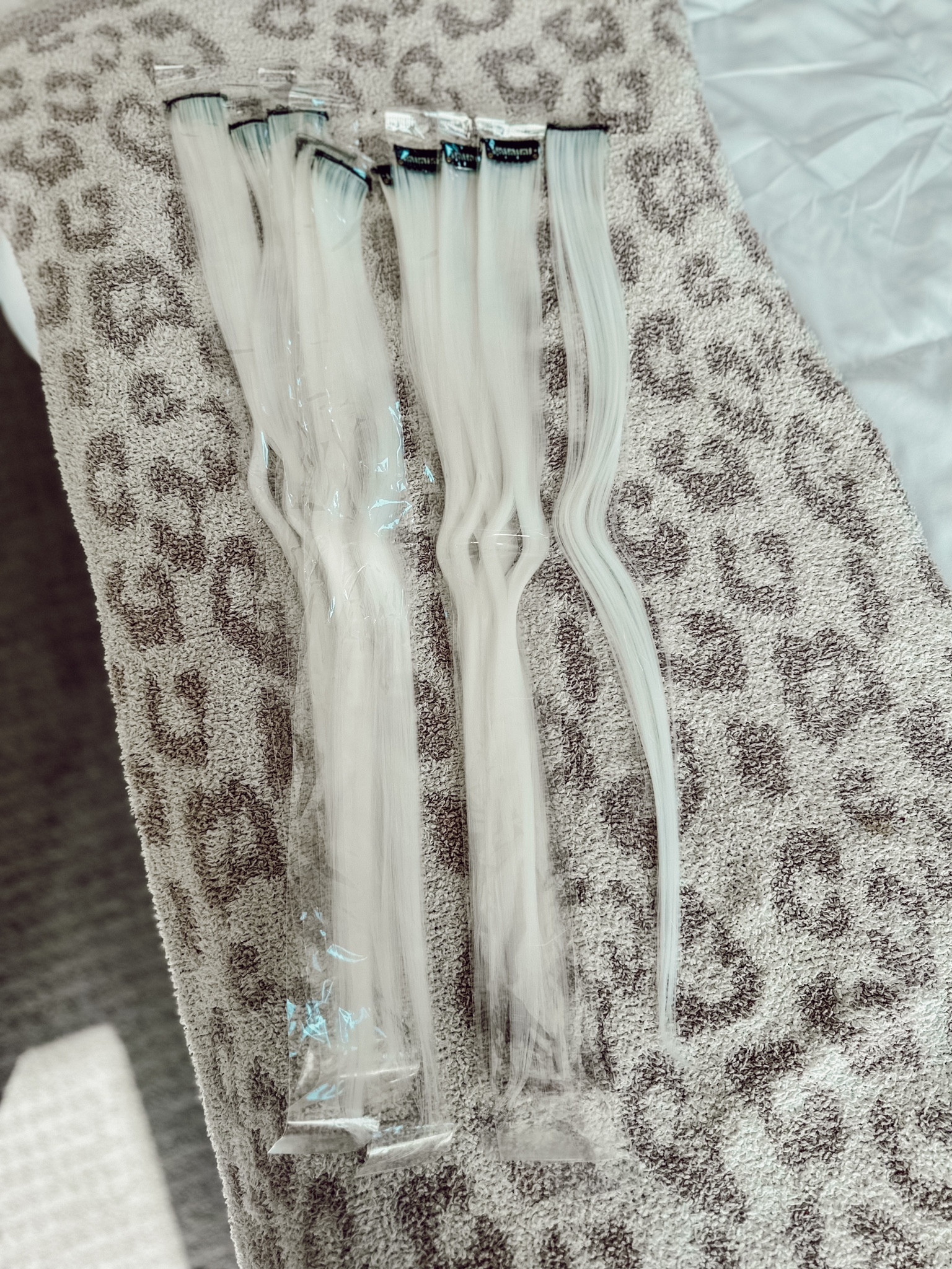 Clip in hair extensions in white to go with my space alien Halloween costume! Going to crimp it so it flows with my natural hair. Comes in a bunch of colors! Can't wait for Halloween

#LTKHalloween #LTKbeauty #LTKstyletip