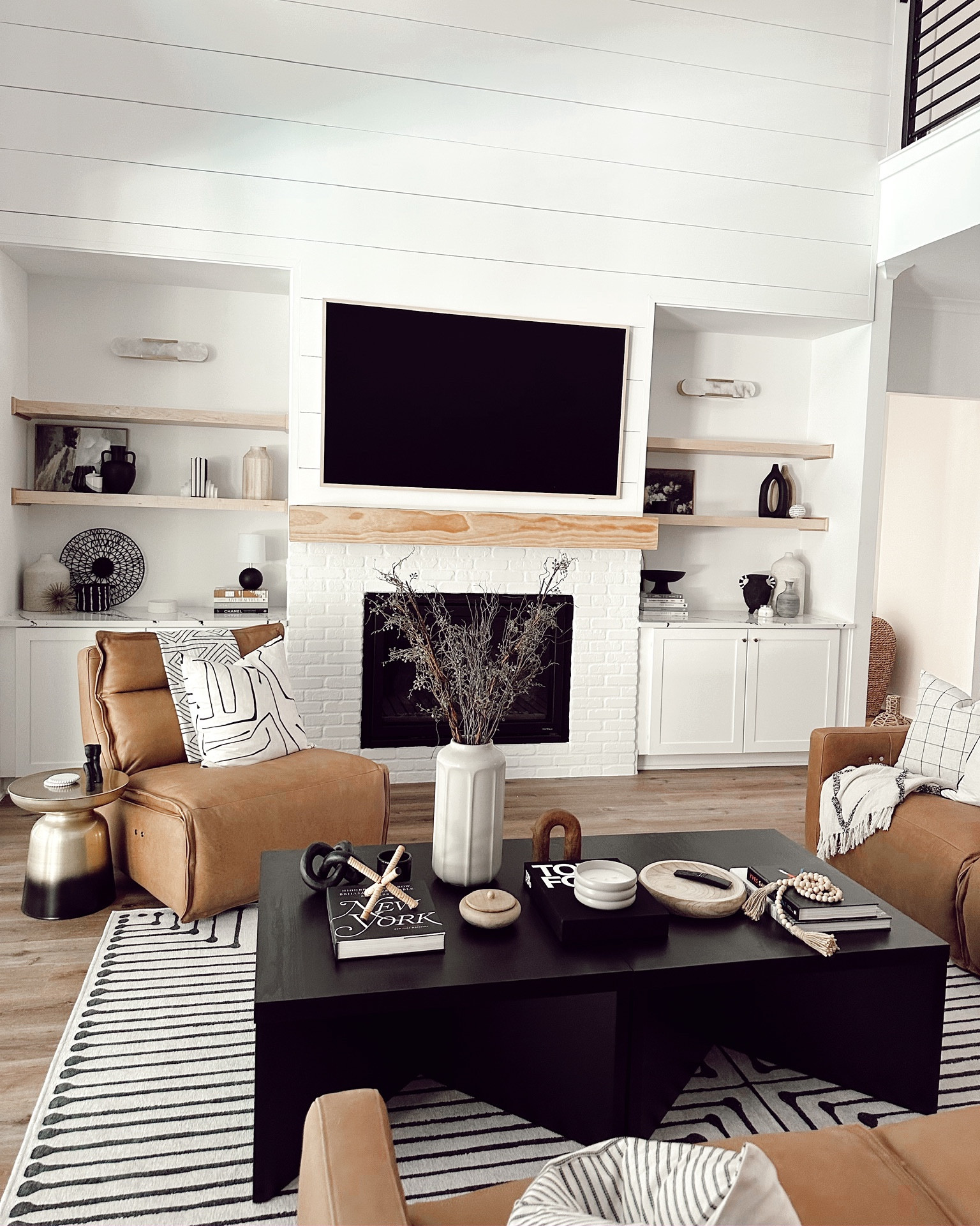 Leather sectional, rug, coffee tables, side tables and styled built ins in our new living room!

#LTKstyletip #LTKhome #LTKfamily