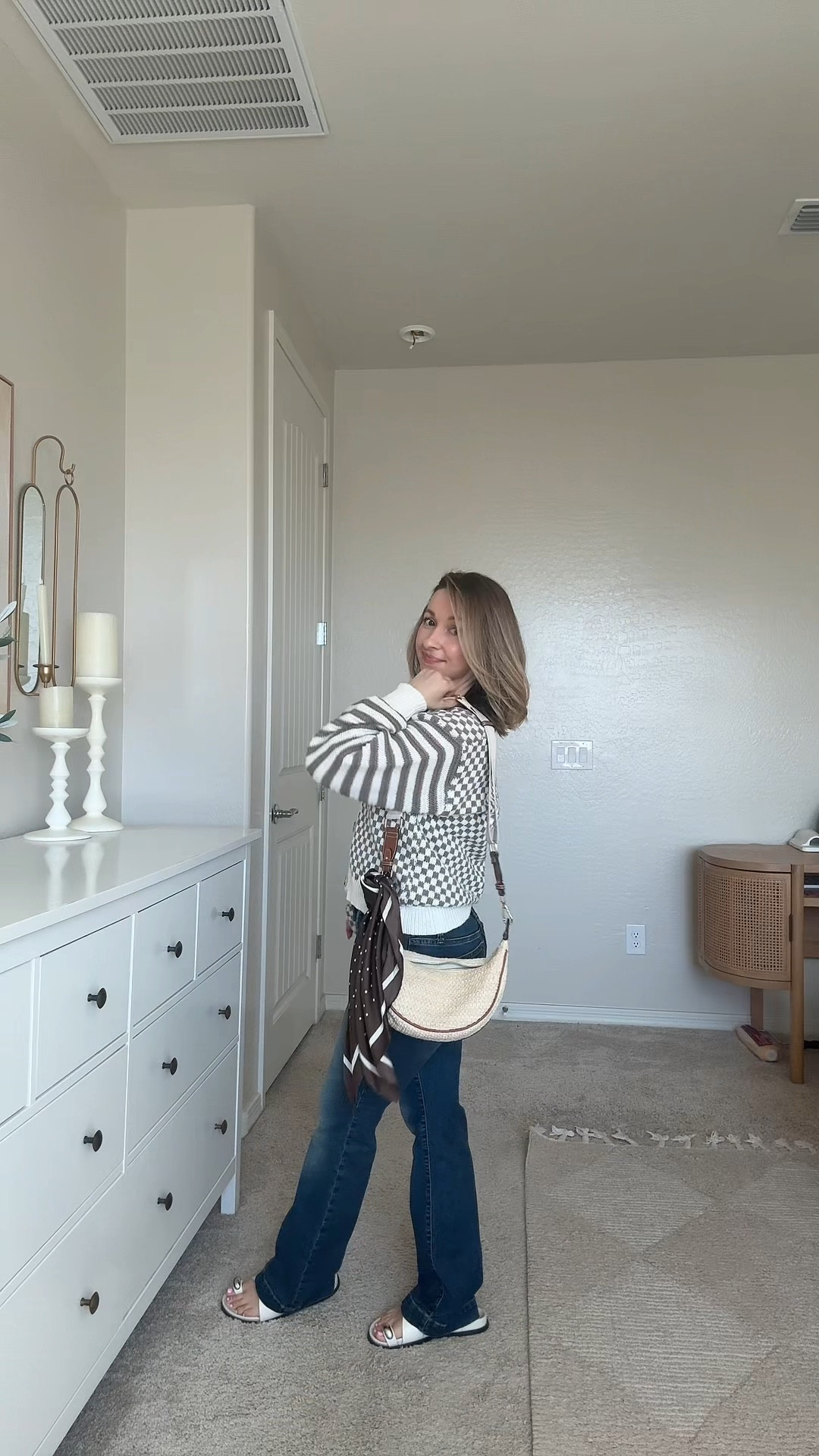 Get dressed with me! Trying to live my closet again! Wearing size 26 long lean low rise dark wash denim in short length, size xs checkered stripe cardigan in brown and white. Size 5 toe ring sandals. Love my brown silk polka dot scarf and barrette set for that elevated chic look with personality



#LTKdayinmylife #LTKgrwm #LTKPetite