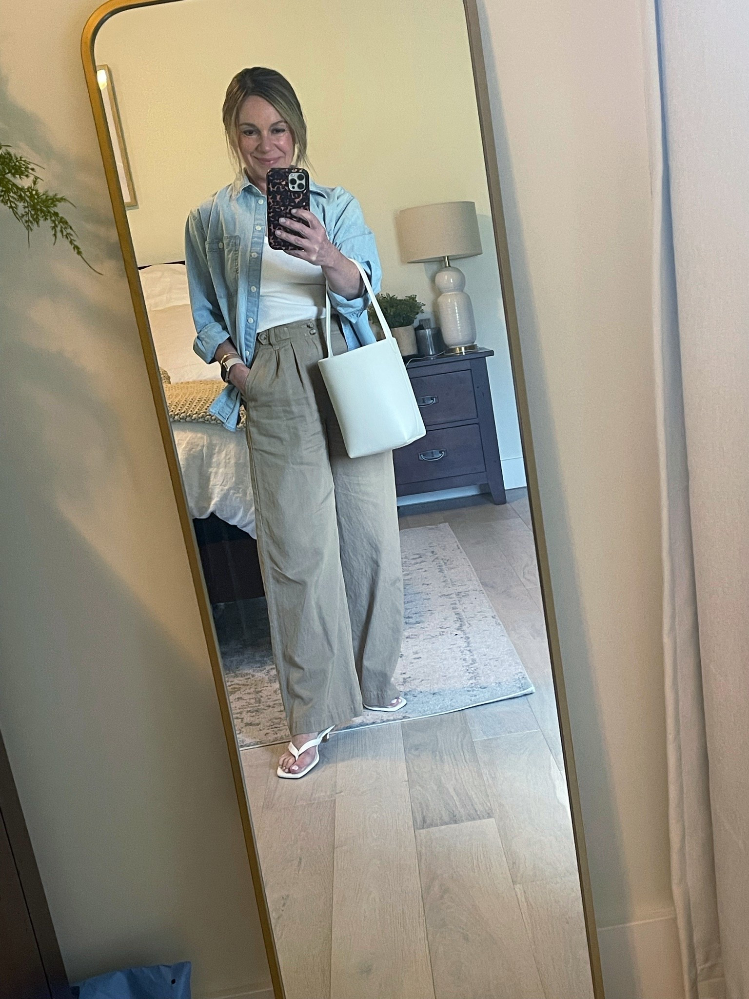 Easy, versatile summer outfit formula - wide leg trousers, tank, button down and comfortable kitten heels. 
#ltkover50 #petite

Pants - Madewell - 0P (older) - linked a great linen pair I have and love that is very affordable 
Tank - Target - S
Denim Shirt - Gap Big Shirt XSP
Heels - Open Edit - TTS

#LTKOver40
