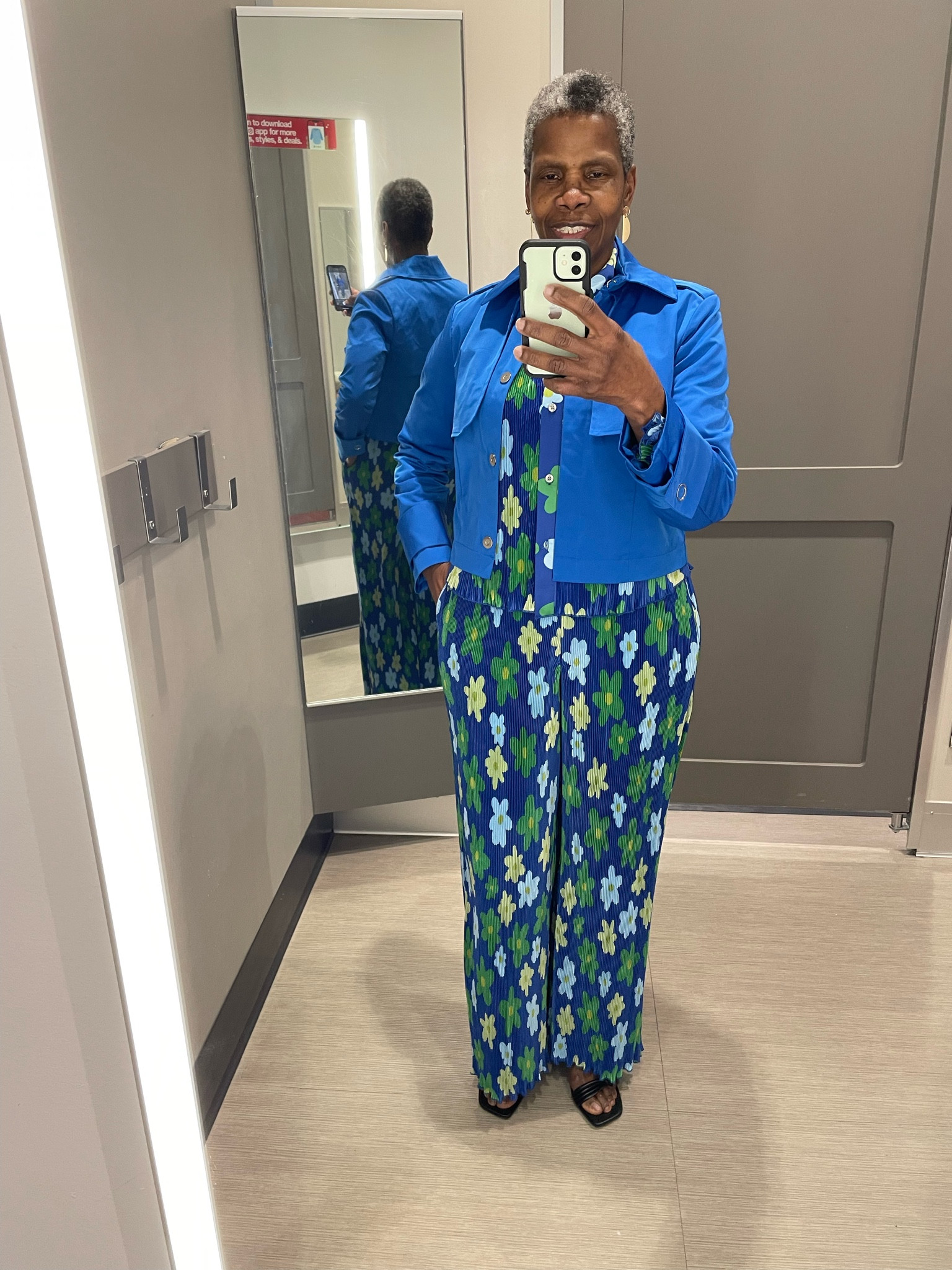 Wide-leg pleated trousers
Dark blue with allover floral print
Full elastic waistband
Full length with wide legs relaxed fit
Side pockets

Long-sleeve button-down shirt
Made from soft, fabric
Allover floral print
Full-length button-down closure
Below-waist length