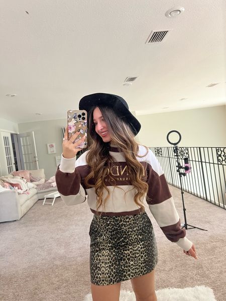 Fall Outfit Inspiration! Live these Abercrombie crew sweatshirts, so elegant and cozy. Wearing a leopard mini pencil skirt, turtleneck under shirt, fall wide brim hat in black, and I curled my hair. Xoxo #datenight #evening #date #fall 

#LTKfindsunder50 #LTKfindsunder100 #LTKworkwear